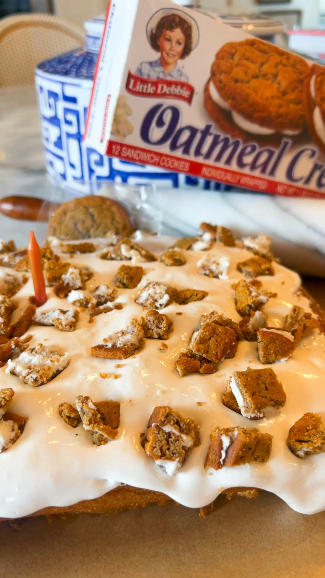 Little Debbie oatmeal creme pie cake 
2 boxes Little Debbie oatmeal creme pies 
1 butter golden cake mix

Bake cake per directions. Pour half into your pan, then layer oatmeal creme pies, and layer remaining cake mix. I baked at 350 degrees for 22 min. Once baked, top with marshmallow fluff and chopped oatmeal cream pies  

#LTKvlog #LTKfoodie #LTKdayinmylife