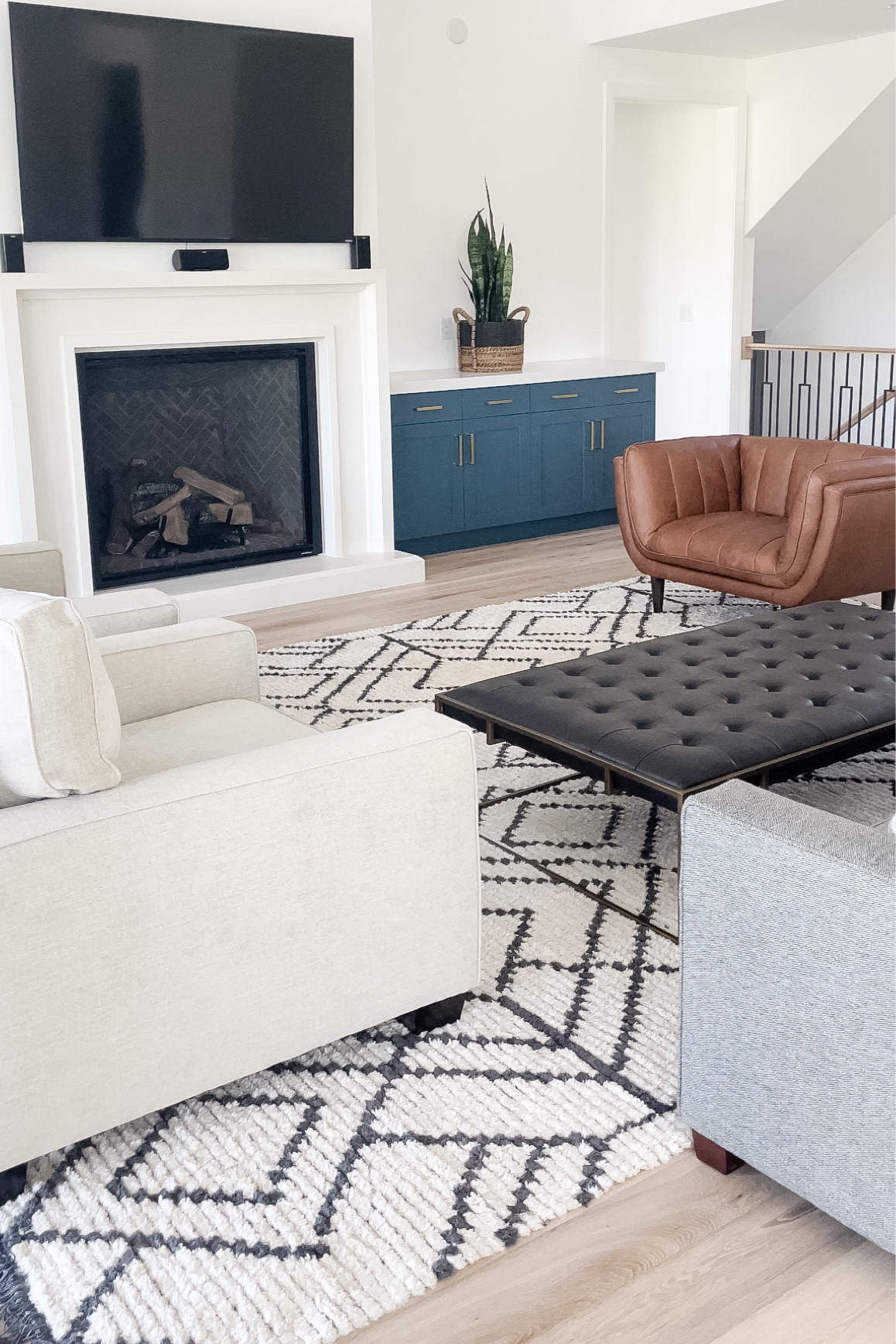 We love our leather coffee table! It’s perfect for lounging but also looks beautiful on its own! We use a tray to hold drinks so it really does it all.

#LTKSeasonal #LTKhome