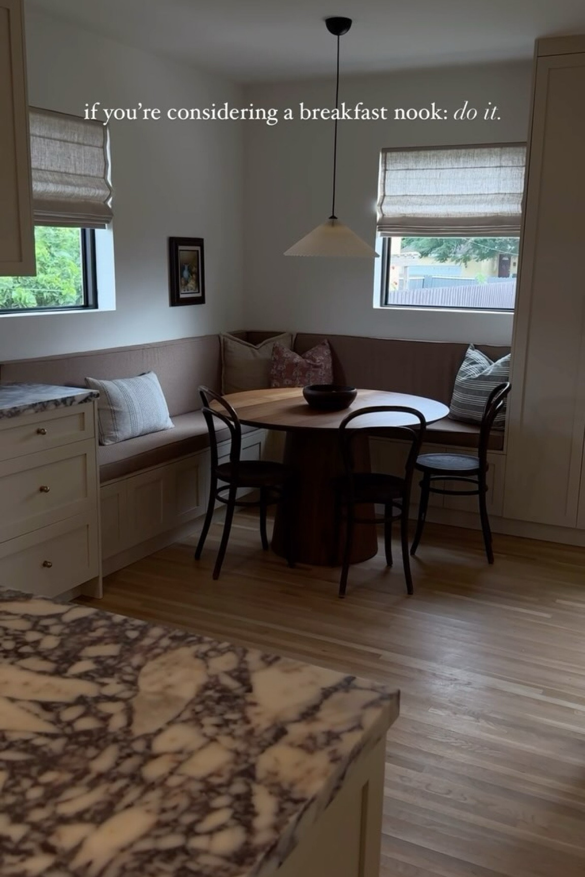 the breakfast nook is finally complete! Even with the dining room a few feet away, this has become one of our favorite places to gather. I wanted the area to feel cozy and lived-in. These custom cushions from @rofielty_ helped tie everything together and I couldn’t be happier🤍