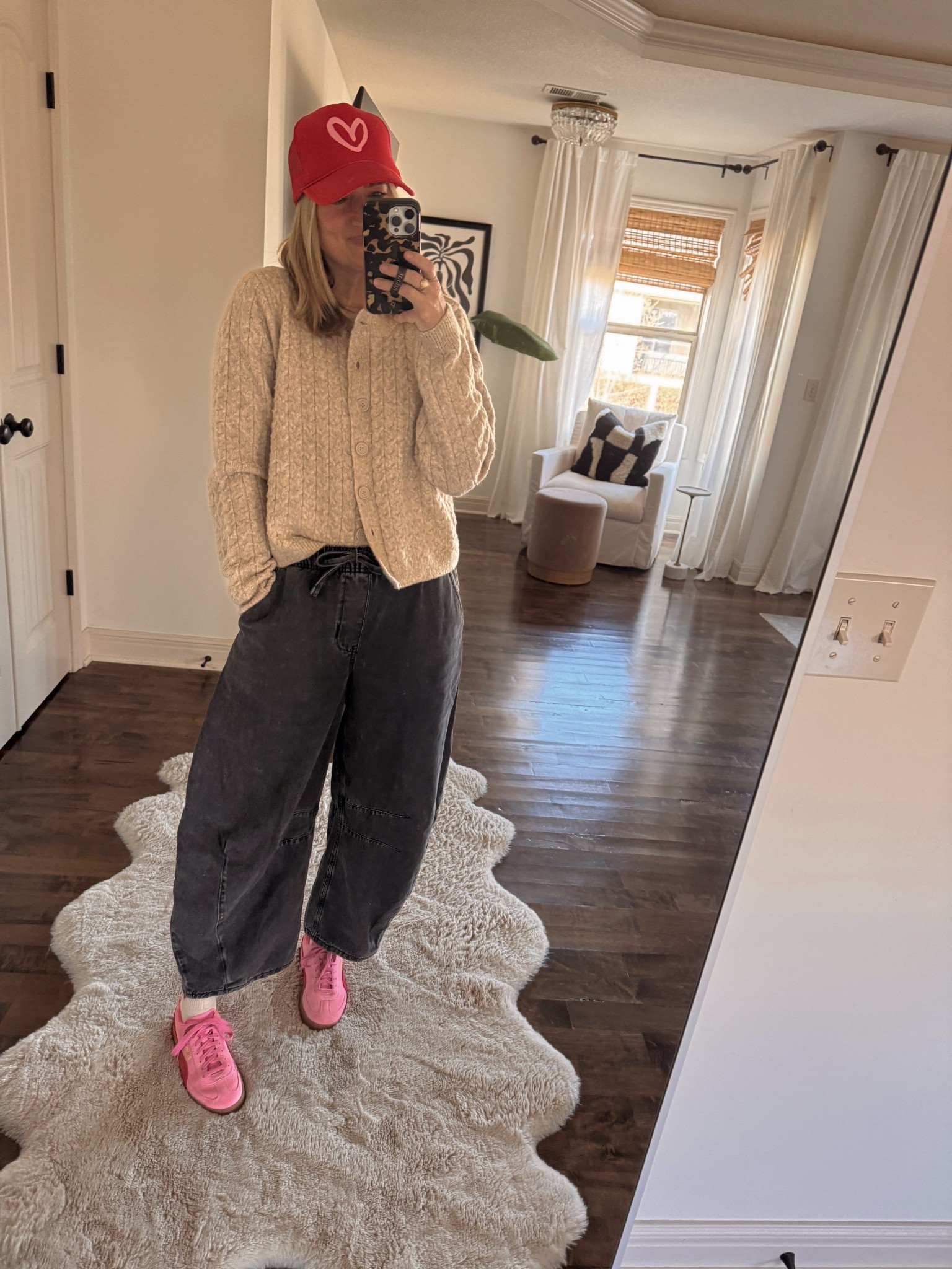 Barrel jeans, pink sneakers, red hat 

#LTKValentine #LTKOver40