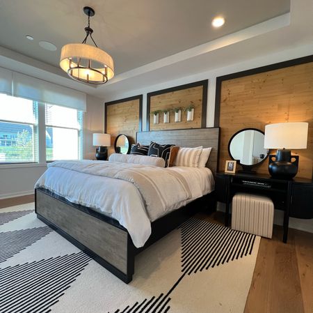 A beautiful staged home with a contemporary look. Warm wood tones mixed with black and white is a classic mix. 



#LTKhome