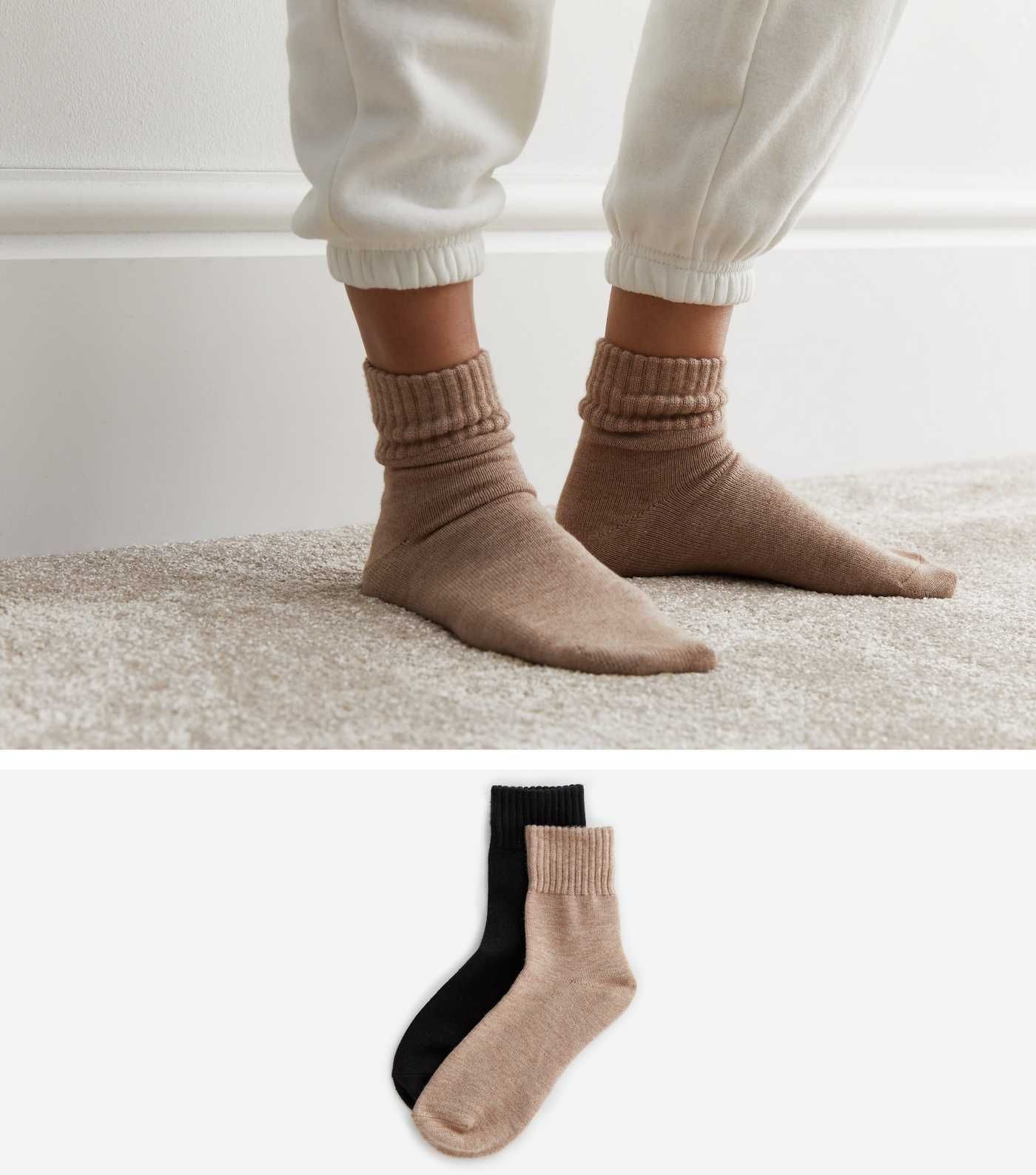 2 Pack Black and Brown Lounge Socks
						
						Add to Saved Items
						Remove from Saved Items | New Look (UK)