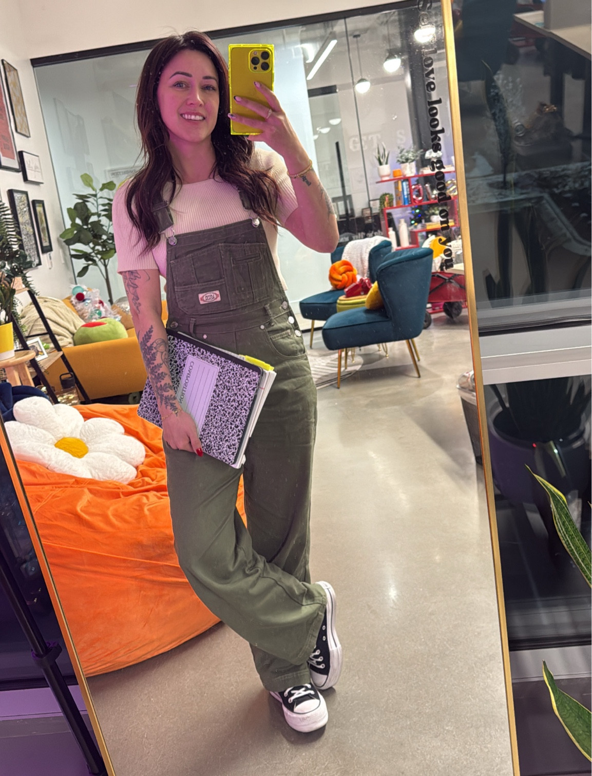 Olive green overalls with high top black converse 

#LTKSeasonal #LTKSaleAlert #LTKFindsUnder50