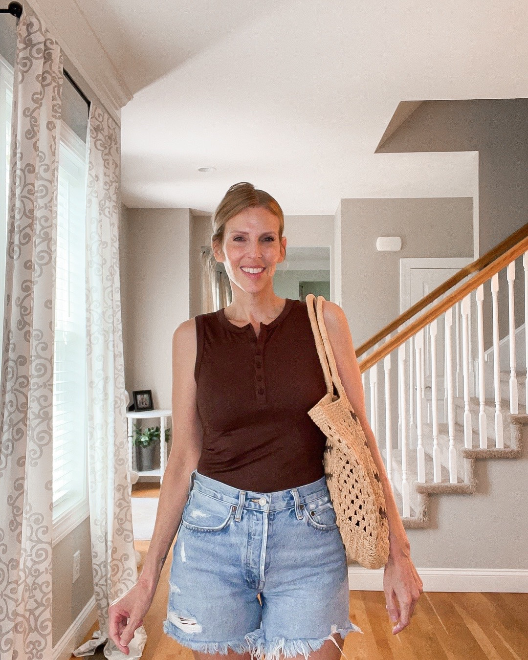 🤎☀️ Casual summer outfit

A fitted tank, distressed denim shorts, flip-flops, and a woven tote—an easy look for warm days, errands, and weekends. 👜✨

#LTKOver40 #LTKSeasonal