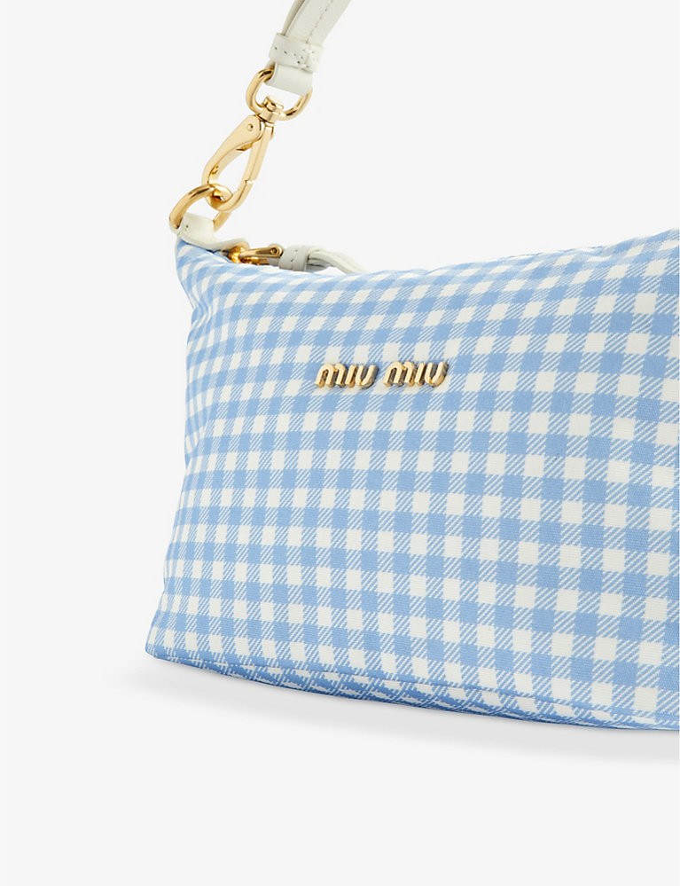 Spirit small check-print woven baguette bag | Selfridges