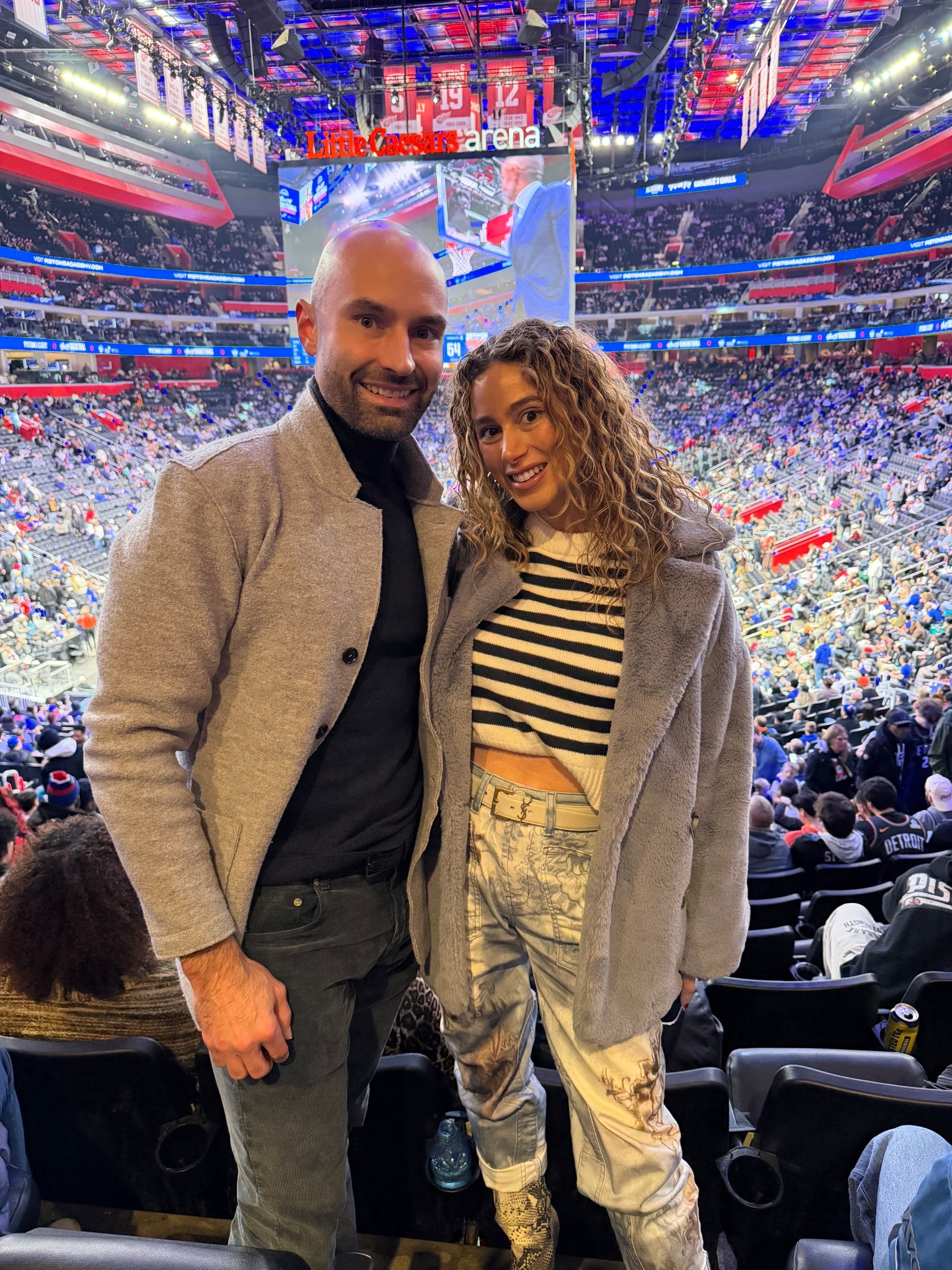 Outfit of the night. Couples outfit. Basketball game outfit. YSL belt. YSL Cassandre Leather Belt. Anthropologie Pilcro denim. 

#LTKootd #LTKSeasonal