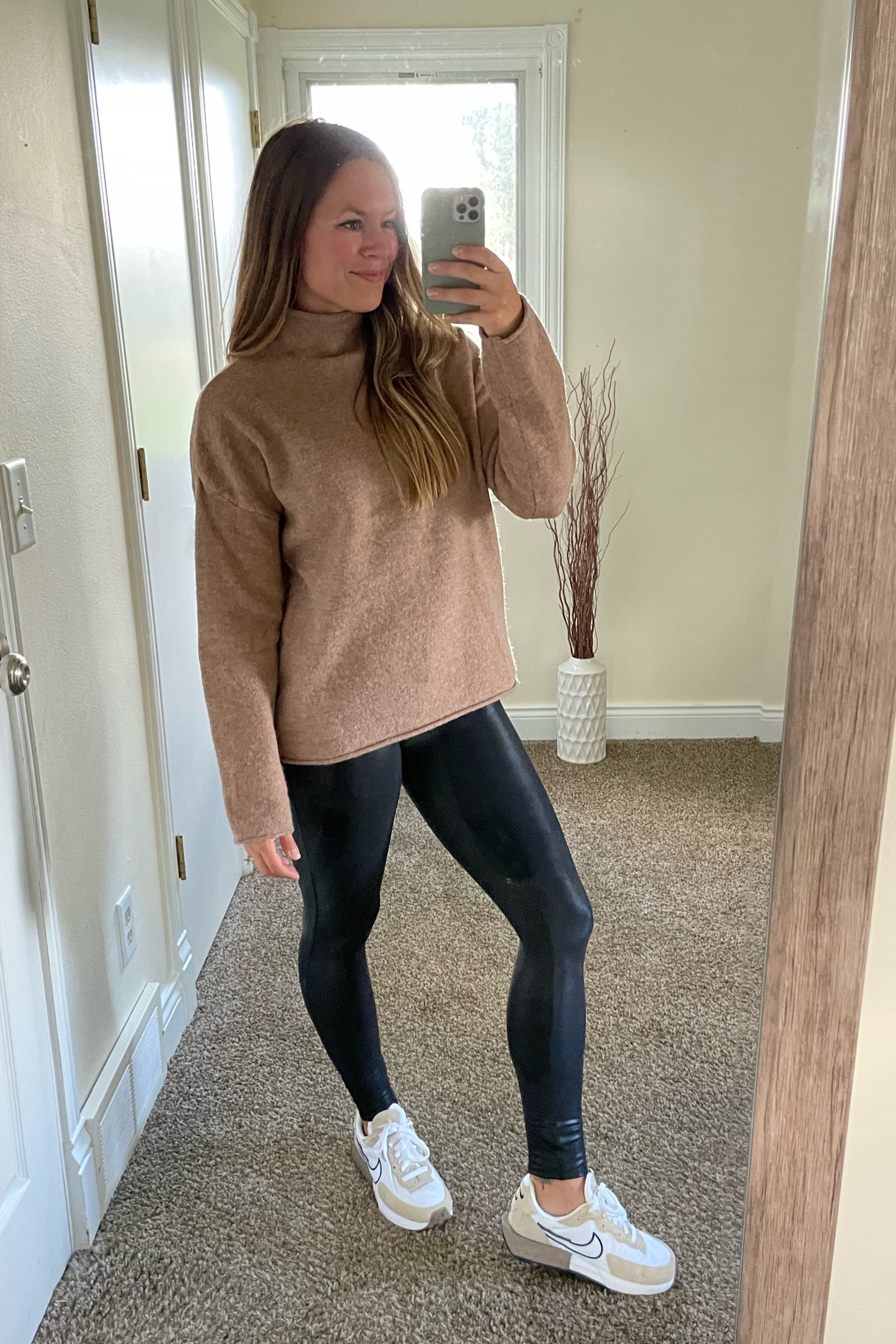 Mock neck sweater with my fav Spanx faux leather leggings. I paired this causal chic fit with my Nike nude sneakers which I’m obsessed with!! This outfit can easily be dressed up or down depending on the shoes!

#LTKSeasonal #LTKunder100 #LTKHoliday