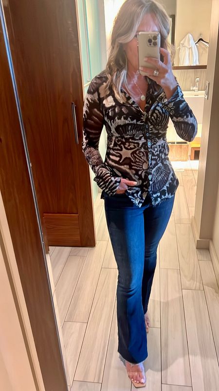 Unique fun fitted top for date night or a night out for women over 40. Fashion over 50, Free People favorite, fall outfit idea, vacation outfit idea, what to wear over 40, jeans, flare jeans, fall outfits, fall fashion 

#LTKstyletip #LTKover40 #LTKSeasonal