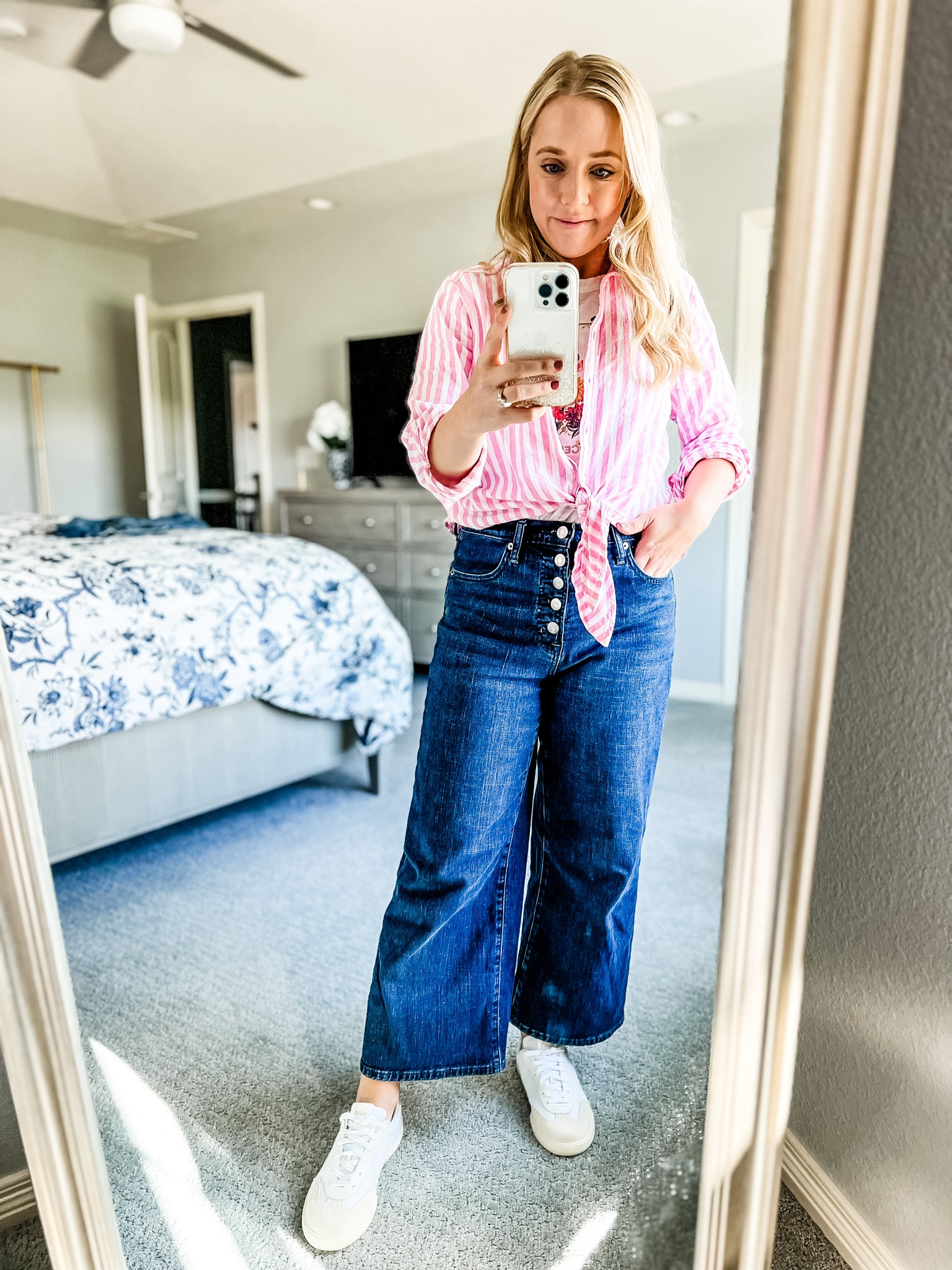 Casual mom outfit. Wide leg jeans, striped button down, and Veja sneakers.

Spring outfit. Mom outfits. Casual outfit. 

#LTKStyleTip