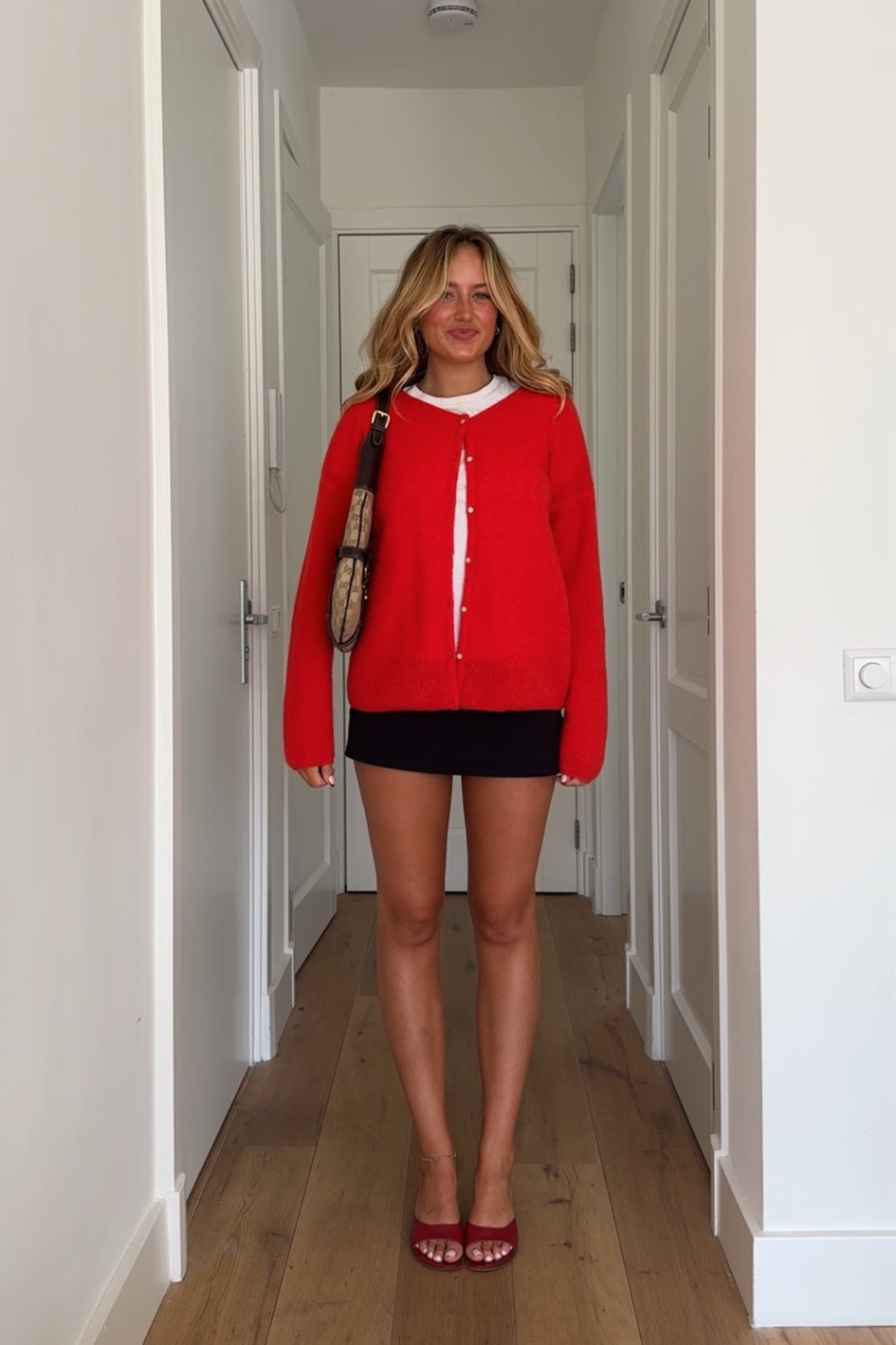 Perfect basic summer outfit with a black mini skirt & a red cardigan 🩷 

#LTKstyletip #LTKsummer #LTKeurope