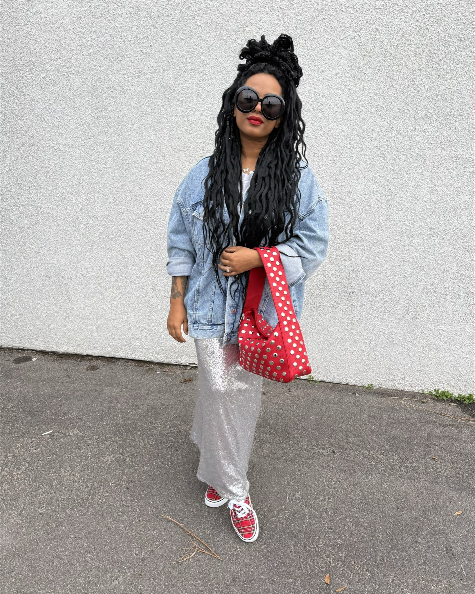 outfit share:
• oversized denim jacket & sunnies
• pop of red studded handbag 
• pop of red lippy
• silver sequins skirt 
• pop of red + plaid sneakers 

#LTKPetite #LTKootd #LTKSeasonal