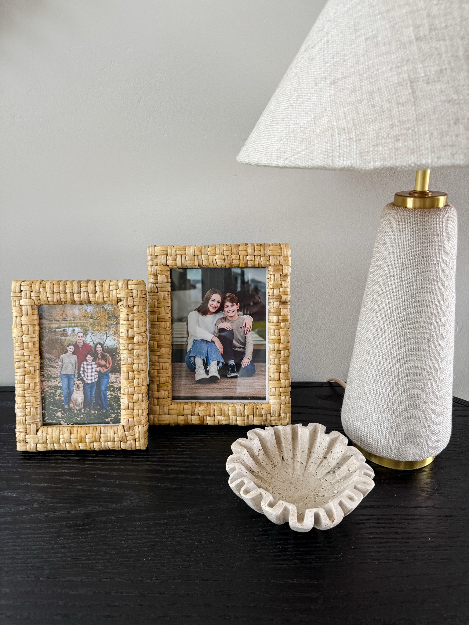 I styled my console table for summer with some new finds and frames with a woven texture.  Paired with this linen lamp and stone bowl it gives a much needed refresh for the season #homedecor #summerhome #neutraldecor @Target @Anthropologie

#LTKSeasonal #LTKHome