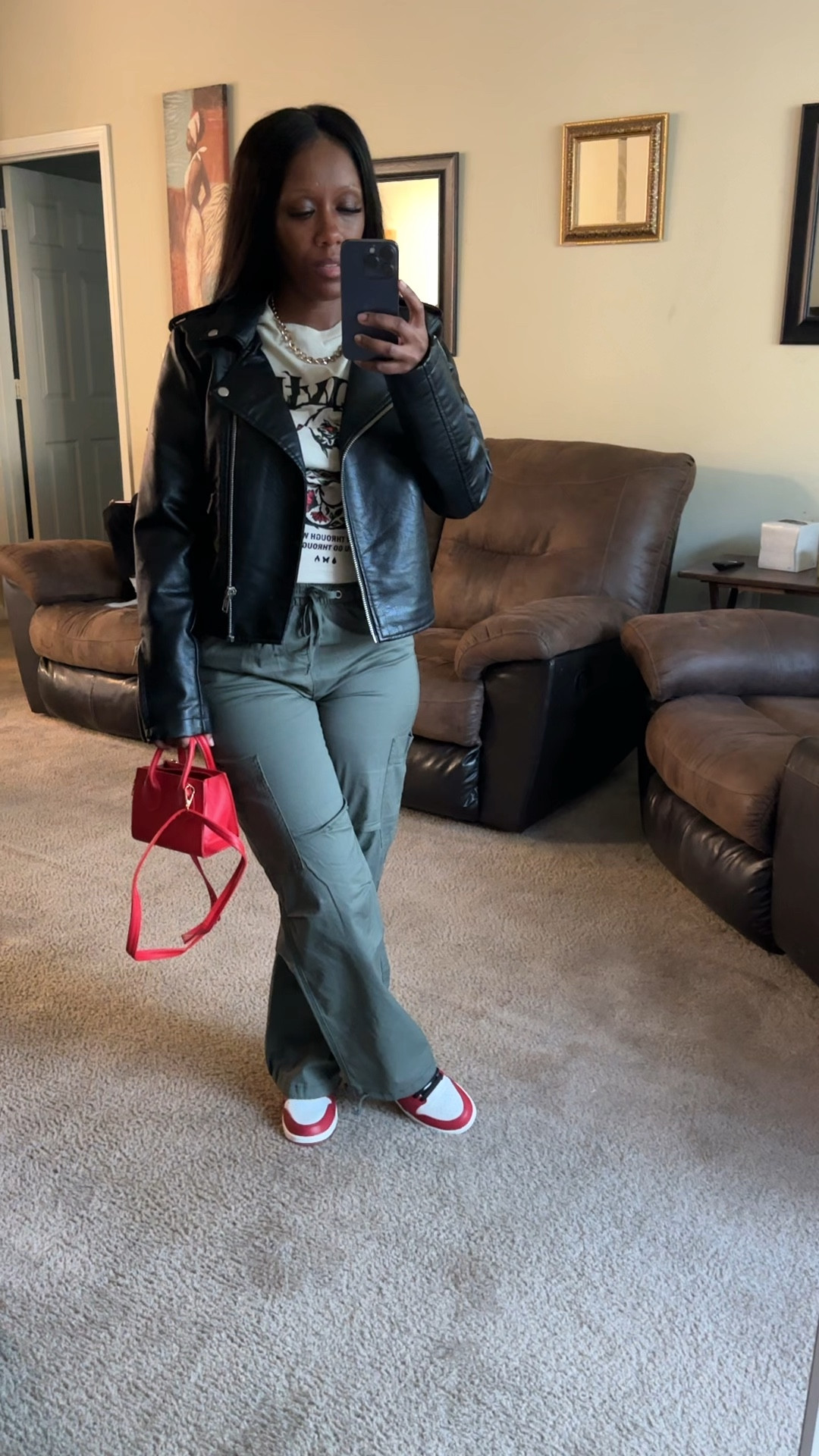 Walmart Fall Outfit Idea

I’m wearing a black faux leather jacket, graphic tee, and green cargo pants.

I styled this casual outfit with a red mini crossbody purse and Jordan 1 lost and found sneakers.

#LTKFindsUnder100 #LTKStyleTip #LTKShoeCrush