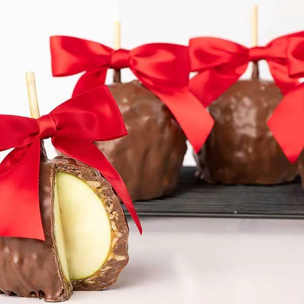 Colossal Caramel Apples by Savannah's Candy Kitchen | Goldbelly | Goldbelly