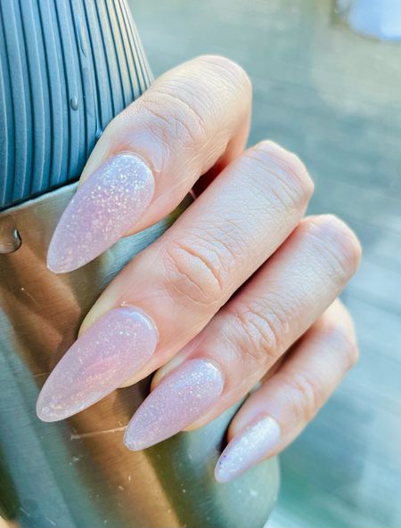 Pink cat eye nails, almond press on nails, pink nails, spring nails, glitter nails, press on nails, fake nailss

#LTKover40 #LTKbeauty #LTKsalealert