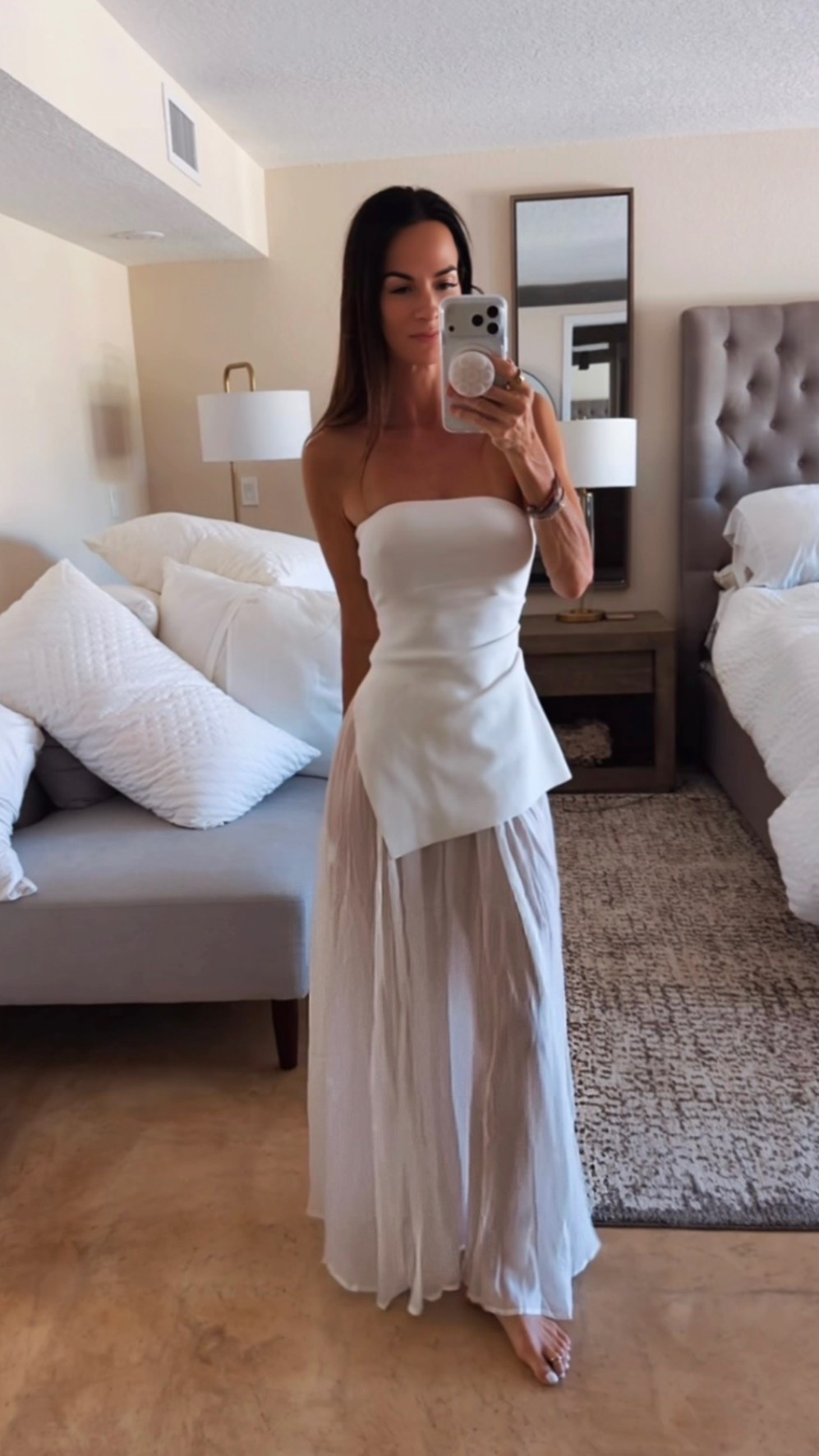 White outfits just hit different. 🤍✨

Two tops, two skirts. Three completely different vibes.

Look 1: Lace skirt for that soft, romantic moment.
Look 2: Sheer skirt because a little drama never hurt anybody.
Look 3: The same sheer skirt with an asymmetric bandeau for a modern twist.

Proof that a few great pieces can create an entire wardrobe. Which one are you reaching for?

XXS long bandeau
XS asymmetrical bandeau
0 skirts

#SummerStyle #WhiteOutfit #NeutralStyle #ResortWear #StyleInspo

#LTKootd #LTKgrwm #LTKdayinmylife