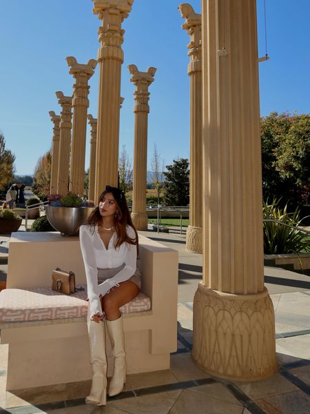 Yes I planned my outfit to match the stunning Darioush winery 🥂 I love this Neutral fall outfit for a sunny fall day 🌞 linked my white blouse from Princess Polly, my skirt is Artizia from years ago but I linked some similar ones here 🤍 along with my cream boots and accessories 

#LTKHoliday #LTKGiftGuide #LTKSeasonal