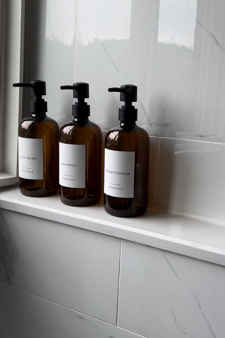 Refillable shampoo, conditioner and body wash containers! These are plastic so if they fall you don’t have to worry about glass breaking. The labels are waterproof!! 

#LTKstyletip #LTKhome #LTKunder50