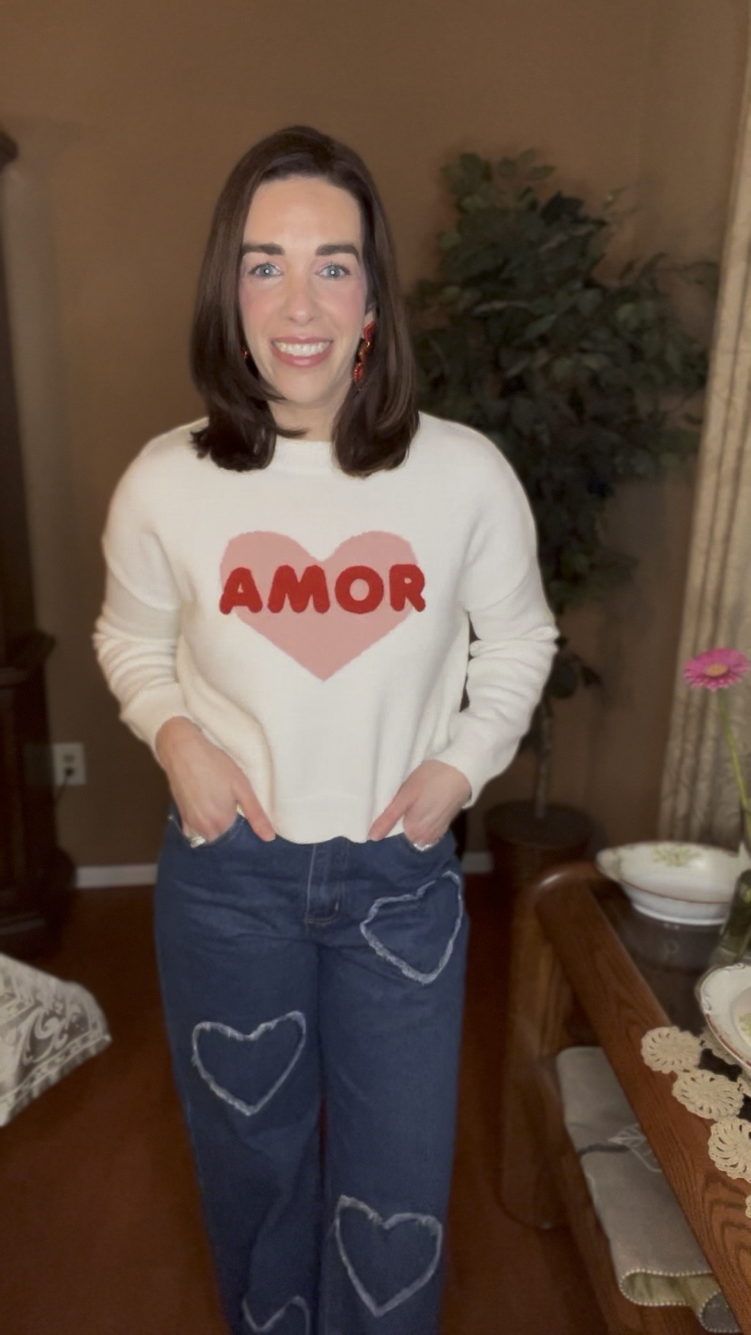 Amor white sweater (extra small). High rise heart wide leg jeans (27). Red sneakers (8.5). #sweater #sweaters #whitesweater #amorsweater #jeans #heartjeans #highrisejeans #widelegjeans #sneakers #redsneakers #valentinesdayoutfit #datenight Valentine’s Day Outfit 
Date Night

#LTKFindsUnder100 #LTKStyleTip #LTKSeasonal
