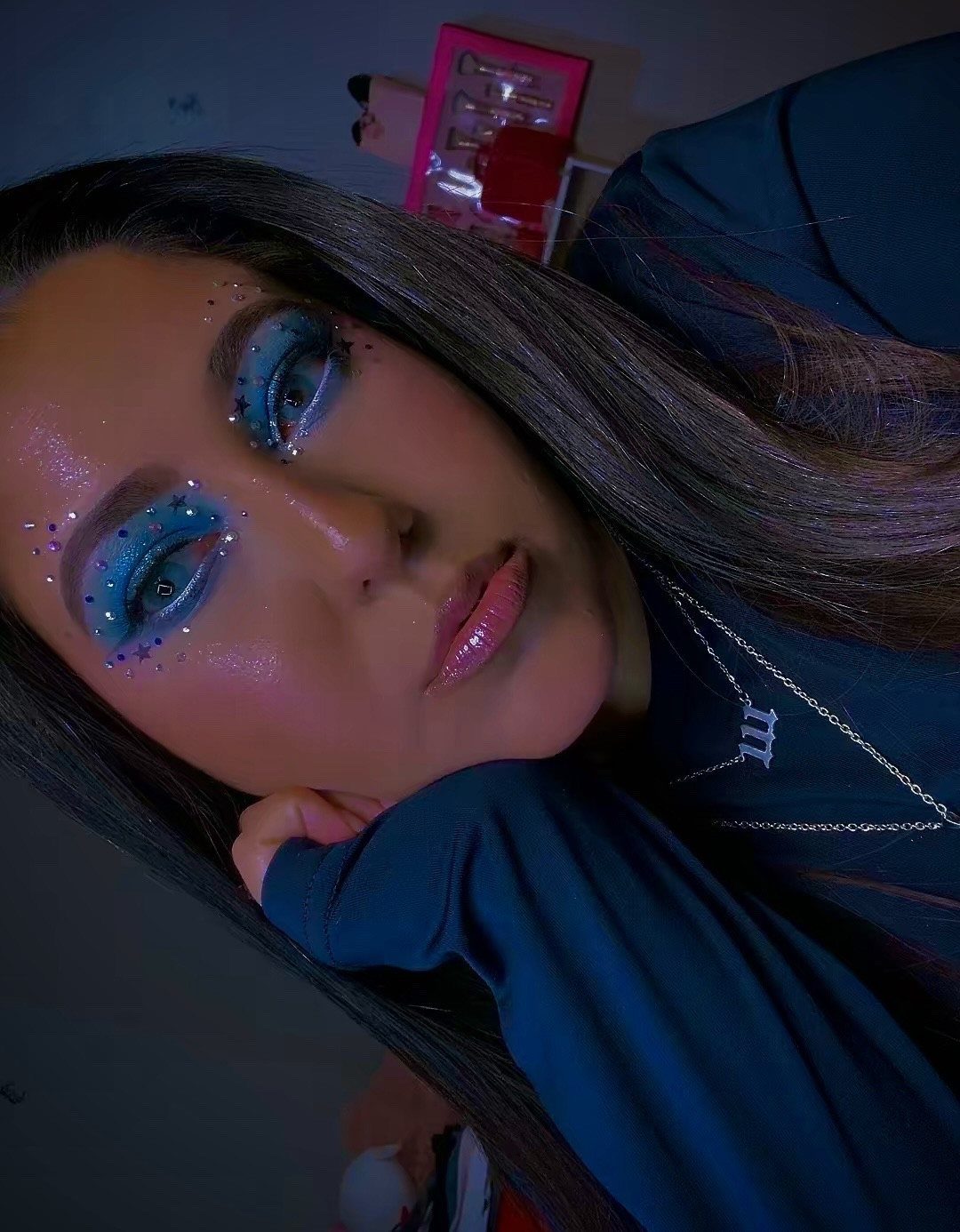 the early 2000s and the galaxy had a baby.💫 

POV: the galaxy decided to land on my eyelids 💙✨

icy blues, starry rhinestones, and skin so glossy it might start reflecting satellites.

if glitter falls off my face tonight just know… the universe is expanding.

creative glam is BACK and I’m not apologizing for it.

who said blue eyeshadow had to behave? 💫

Product details: ⬇️ 

Face: 🤷🏻‍♀️
@hudabeauty - Easy Blur Primer
- #FauxFilter Concealer (Whipped Cream)
- Easy Bake Pressed Powder (Pound Cake) 

@catrice.us - Soft Glam Filter Fluid (020) 

@tartecosmetics - Shape Tape Ultra Creamy (Fair Beige) 

@lagirlcosmetics - PRO.conceal HD High Definition Concealer (Dark Cocoa) 

@patrickta / @patricktabeauty - Crème Contour & Powder Bronzer Duo (She’s Sculpted) 
- Major Headlines Double Take Crème & Powder Blush Duo (Thank Me Later) 

@mcobeauty - Miracle Flawless Pressed Powder (1 Light) 
- Miracle Flawless Setting Spray 

@morphebrushes - Highlighter Stick (Over Ice) 

@phofay_shop - Shine Shimmer Highlighter (01) 

Eyes: 👀 
@juviasplace - Wahala Eyeshadow Palette 

@glamlite x @mikaylajmakeup Eyeshadow Palette 

@morphebrushes - Mixed Signals Dual-Ended Cream & Liquid Shadow Stick (Timely/Timeless) 

@hudabeauty - Quick ‘N Easy Precision Liquid Liner (Extreme Black) 

@lacolorscosmetics - Tattoo Stamp Pen (Star) 

@beautycreations.cosmetics - Betty Boop Vibrant Gel Liner (Water) 

@grandecosmetics - Wrap Tubing Mascara with ProVitamin B5 

@velourbeautyofficial - Self-Adhesive Lashes 

Lips: 🫦
@maccosmetics - Lip Pencil (Stone) 

@fentybeautyme - Gloss Bomb Stix High-Shine Gloss Stick (Icy Amethy$t)

@morphebrushes - Dazzled Drip Glass High Shimmer Lipgloss (Pink Sapphire) 

•
•
#beautyinfluencer #makeup #explorepage✨ #blueaesthetic

#LTKspringtrends #LTKselfcare #LTKBeauty