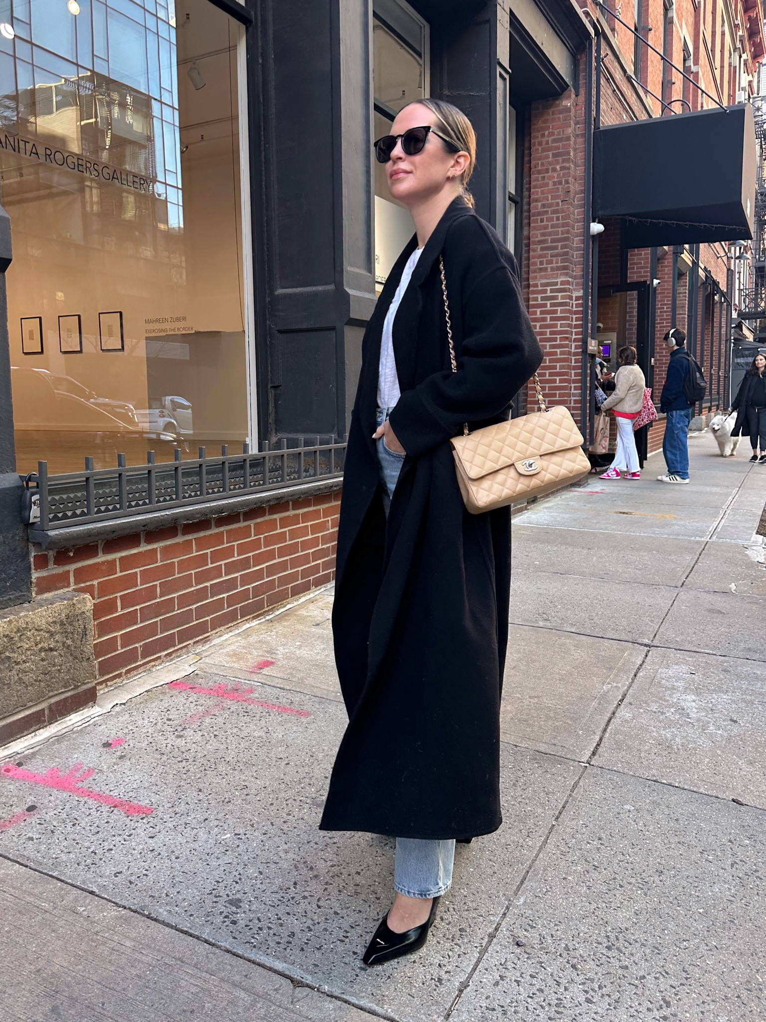 I am wearing a M in the coat (runs TTS). Shoes also run true to European sizing. I am in a 39.5 and wear a 8.5 in US. 