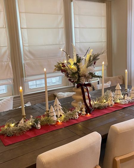 Dining room
Holiday Christmas seasonal
Home decor
Tablescape 
Red ribbon flocked frosted candles trees garland greenery 

#LTKHoliday #LTKhome #LTKSeasonal