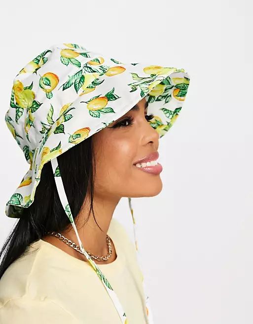 Monki sun hat with chin tie in lemon print | ASOS (Global)