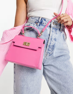 ASOS DESIGN lock detail bag with top handle and detachable crossbody strap in pink | ASOS (Global)