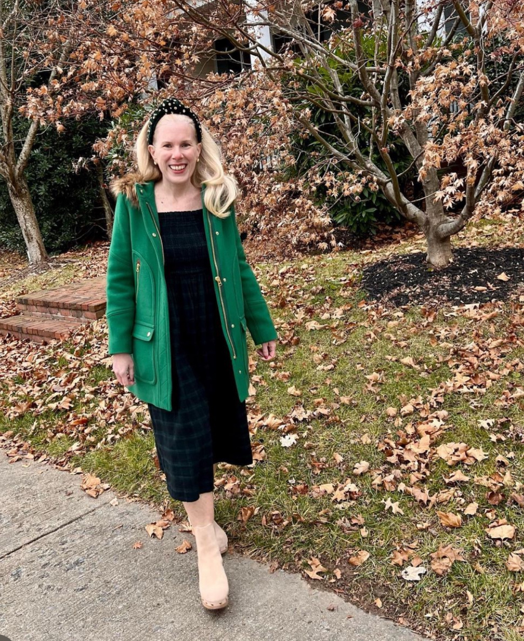 Best winter coat!
.
If you’re going to buy a winter coat, make it an investment piece that you can wear for decades. 
.
This wool parka features a removable faux fur trim around the hood, deep pockets and cool zipper details. 
.
Here I’m pairing it with clog boots (last season) and a black watch plaid dress.

#LTKSeasonal #LTKover40 #LTKHoliday