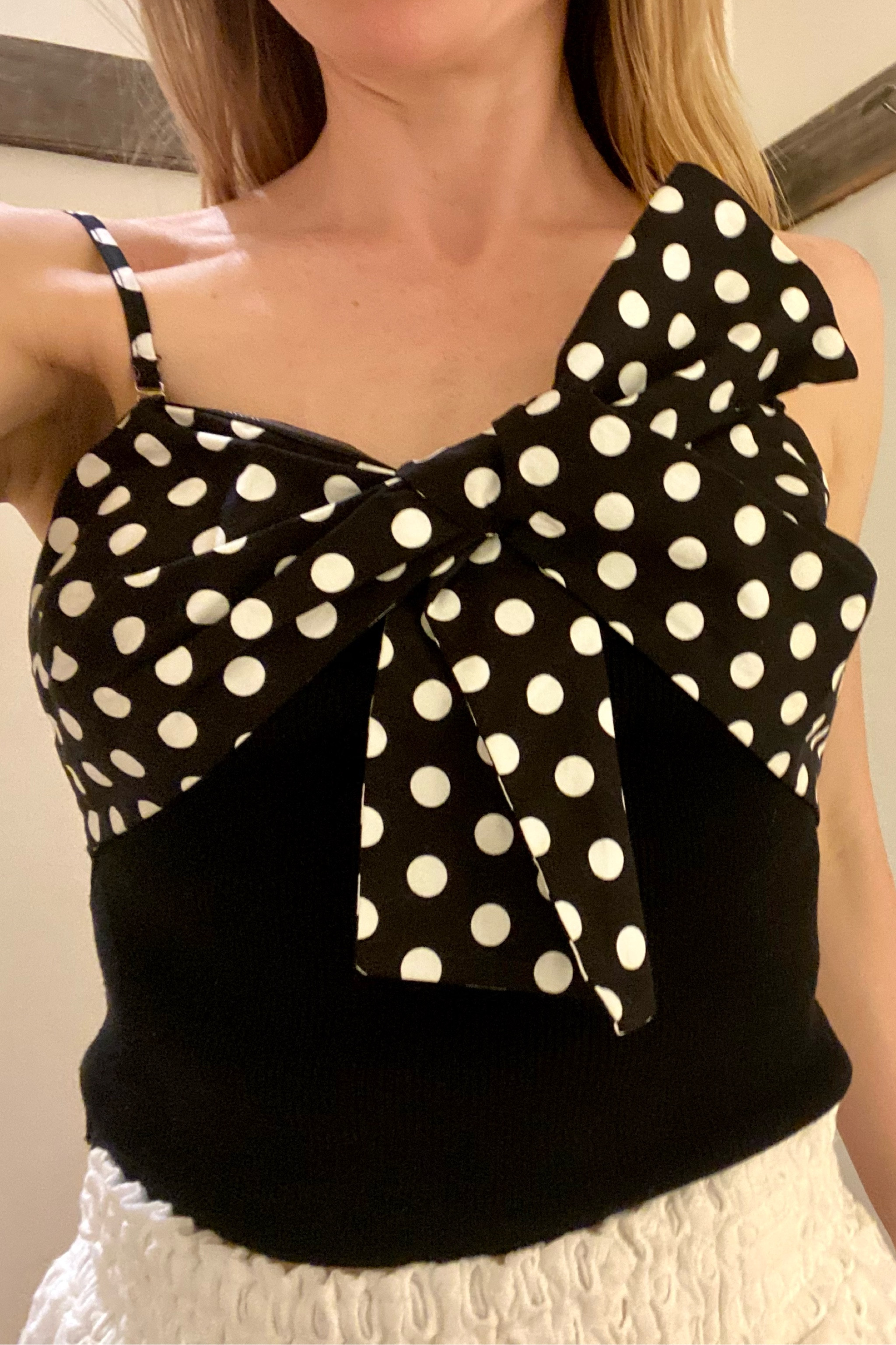 This cami top with a large bow is so cute! Wearing size medium but small would be better.

Black and white top, polka dot outfit, polka dot top, top with large bow, summer top, date night top, top with large bow, Anthropologie top

#LTKunder100 #LTKxAnthro #LTKFind
