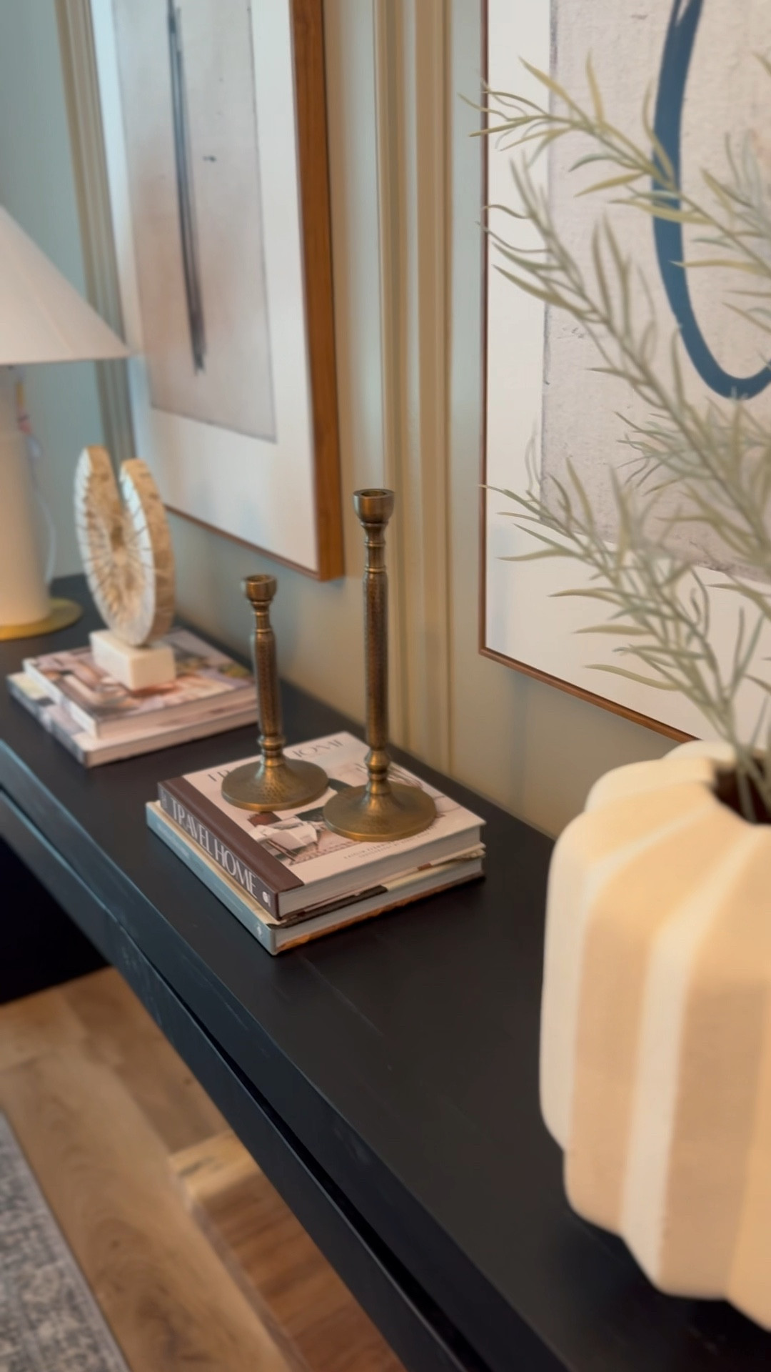 Console table styling inspo ✨

Home/ console styling/ home decor inspo/ lamp / books / artwork 

#LTKStyleTip #LTKHome