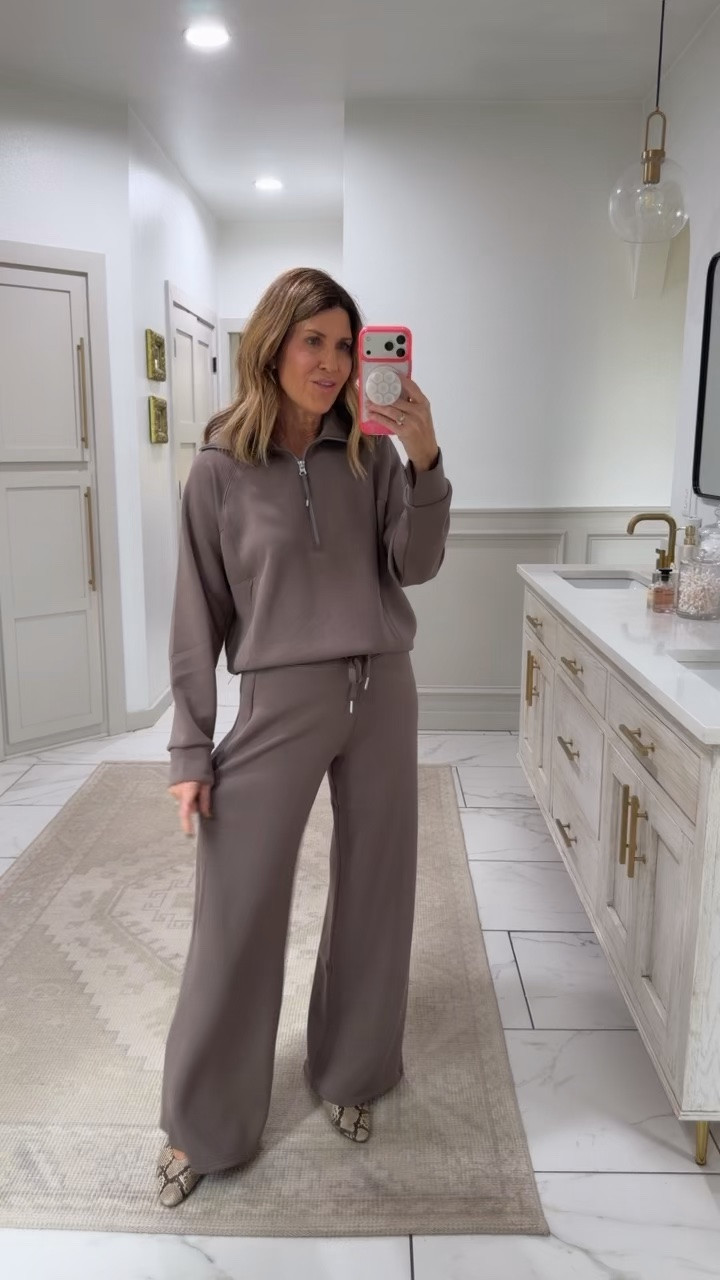 Travel + lounge + active in the comfiest matching sets 👏🏼 Comment SHOP and I’ll send you the links. 

The newest @Spanx fall drop takes some of my favorite pieces from workout, to travel day, and everything in between! Use code TSHXSPANX for 15% off first purchase + free shipping, excluding sales (new customers only) #ad 

Fit: slightly large, but I size up to a medium top and medium pant in regular length for extra comfort! Color I’m wearing: iron stone but love these sets so much I also have in red, classic black, and mushroom 🤍

#LTKOver40 #LTKTravel #LTKootd
