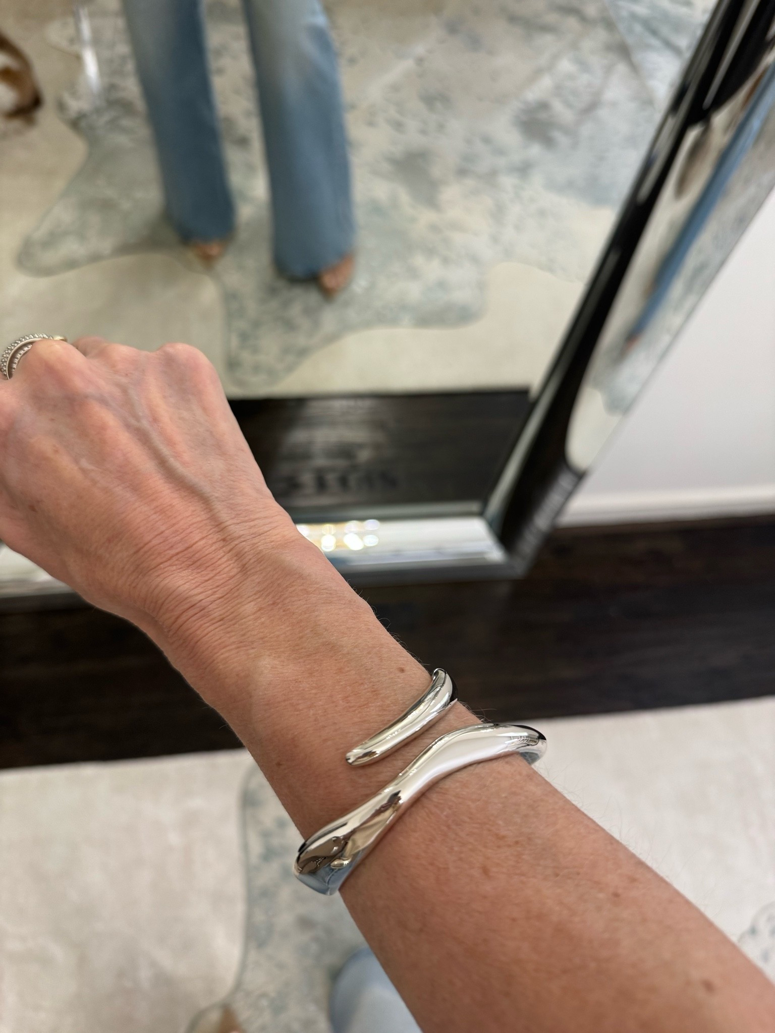 Statement silver cuff bracelets are one of my favorite jewelry trends right now, and this sculptural silver cuff looks so chic and elevated ✨ #SilverJewelry #StatementJewelry #LTKOver40 

 #LTKootd #LTKSeasonal #LTKOver40