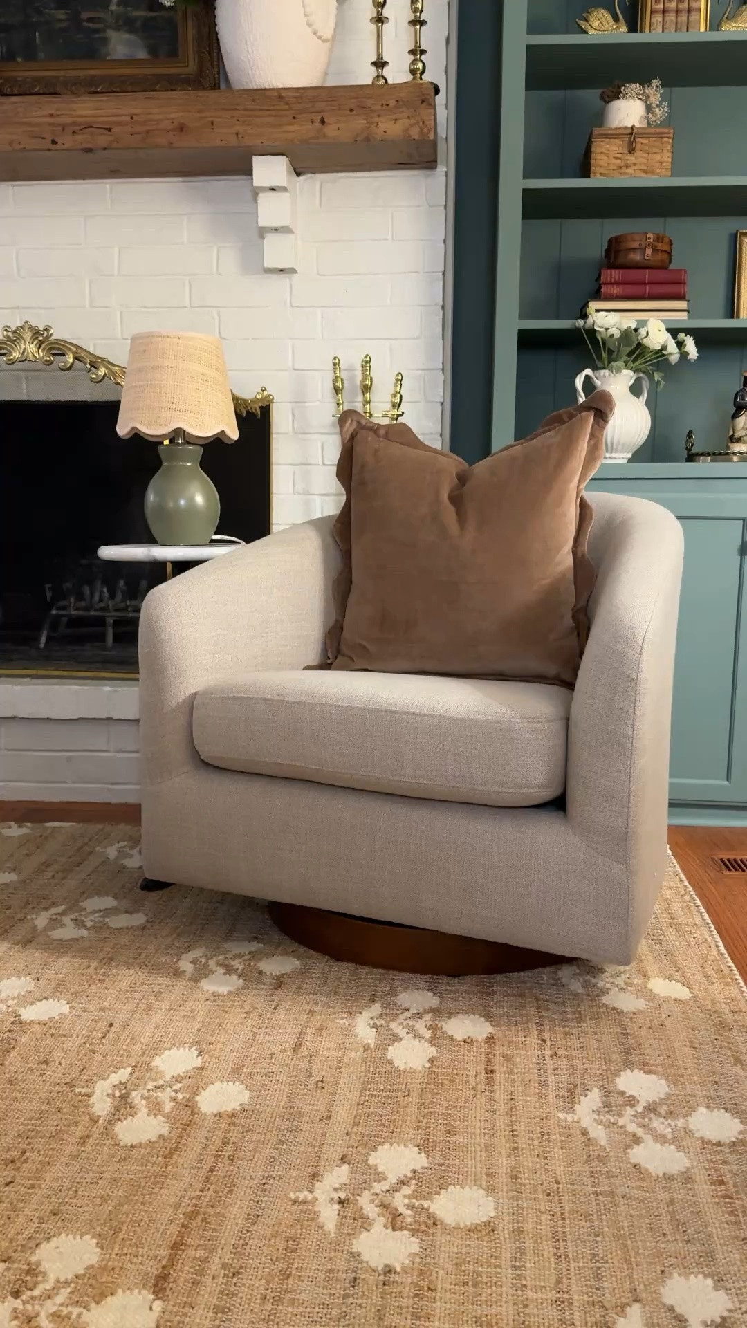 This upholstered swivel chair is currently on sale and comes in a variety of colors. Shipping is free and fast. This one is the “Effie Flax.” Also, linking the gorgeous scallop edge velvet pillow, cute table lamp, wool and jute rug, and coffee table. All from Birch Lane🤍

#LTKSeasonal #LTKHome #LTKSaleAlert