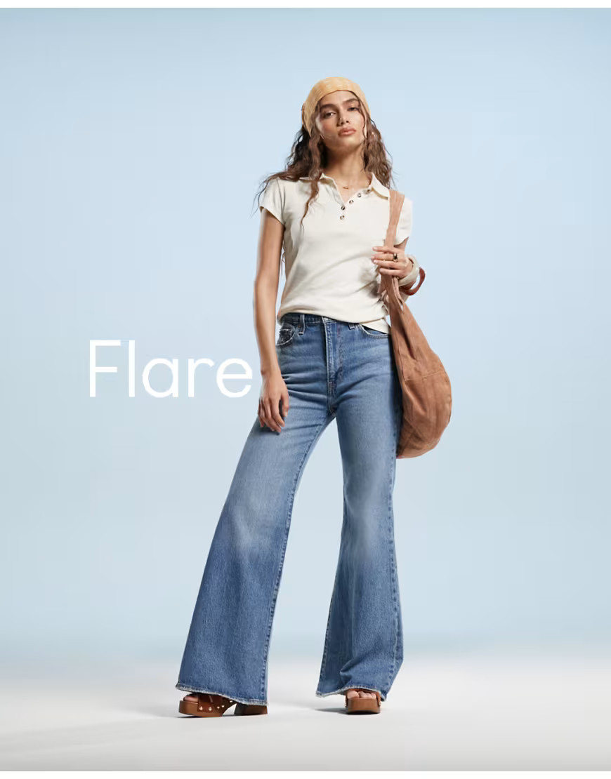 Levi's Ribcage bell high rise flare jeans in mid blue | ASOS (Global)