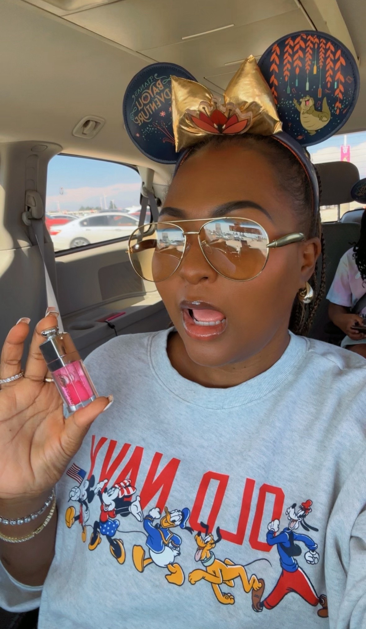 Disney old navy sweatshirt, Gold aviator sunglasses and Dior lip oil

#LTKFindsUnder50 #LTKBeauty #LTKSeasonal