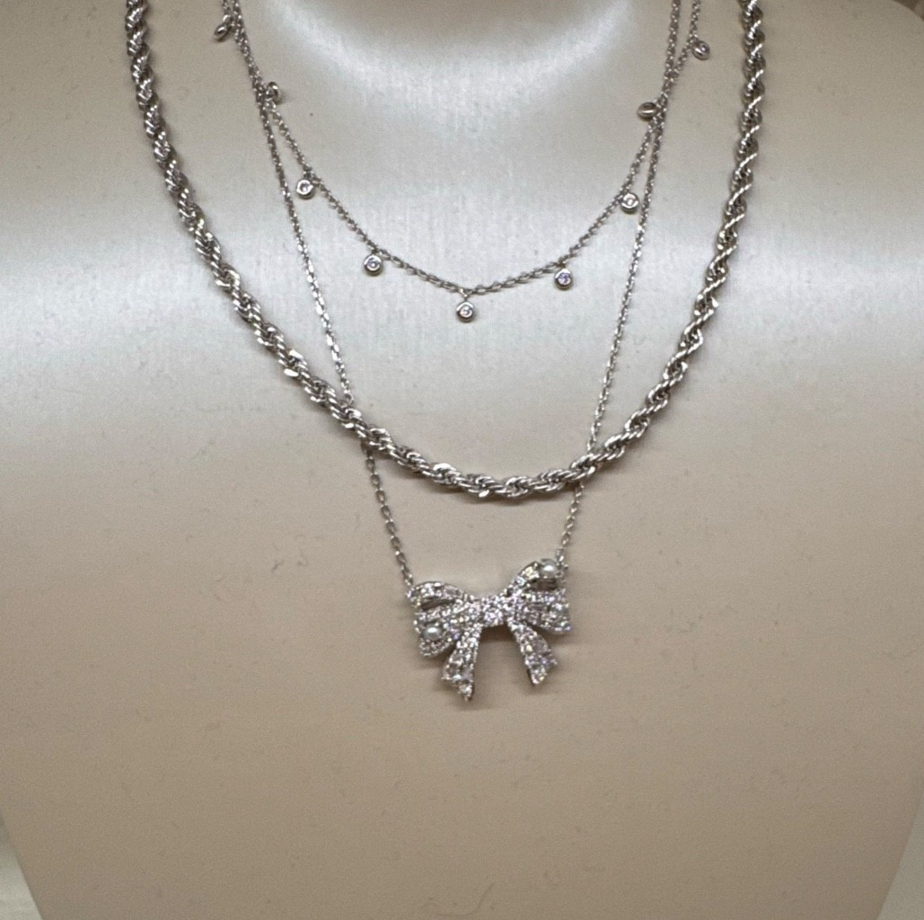 Don’t want the traditional heart necklace for Valentine’s!  Kendra Scott has you covered.  

Bow necklace, reversible necklace, crystal necklace, necklace with a bow, necklaces that can stack easily, necklaces that look good stacked, women’s necklaces, women’s affordable necklaces

#LTKFindsUnder100