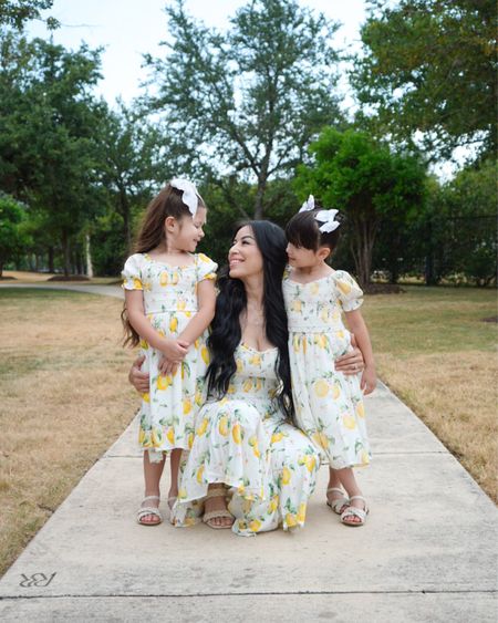 The perfect summer dress 🍋 
How darling are these lemon printed dresses from @ivycityco I shared in stories yesterday! 🫶🏻 Shop with my code HEYITSRUBEE15 to save 15% on your order. #ivyonyou #ivycityco #ivycityambassador #ivycityinfluencer

#mommyandme #twinning #mommyanddaughter #summerdress #summerdays #summertime #summervibes #summeroutfit #summeroutfitideas 

#LTKSeasonal #LTKFind #LTKfamily