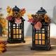 Gerson Set of 2 black metal lanterns with B/O LED candles and floral accents | Walmart (US)
