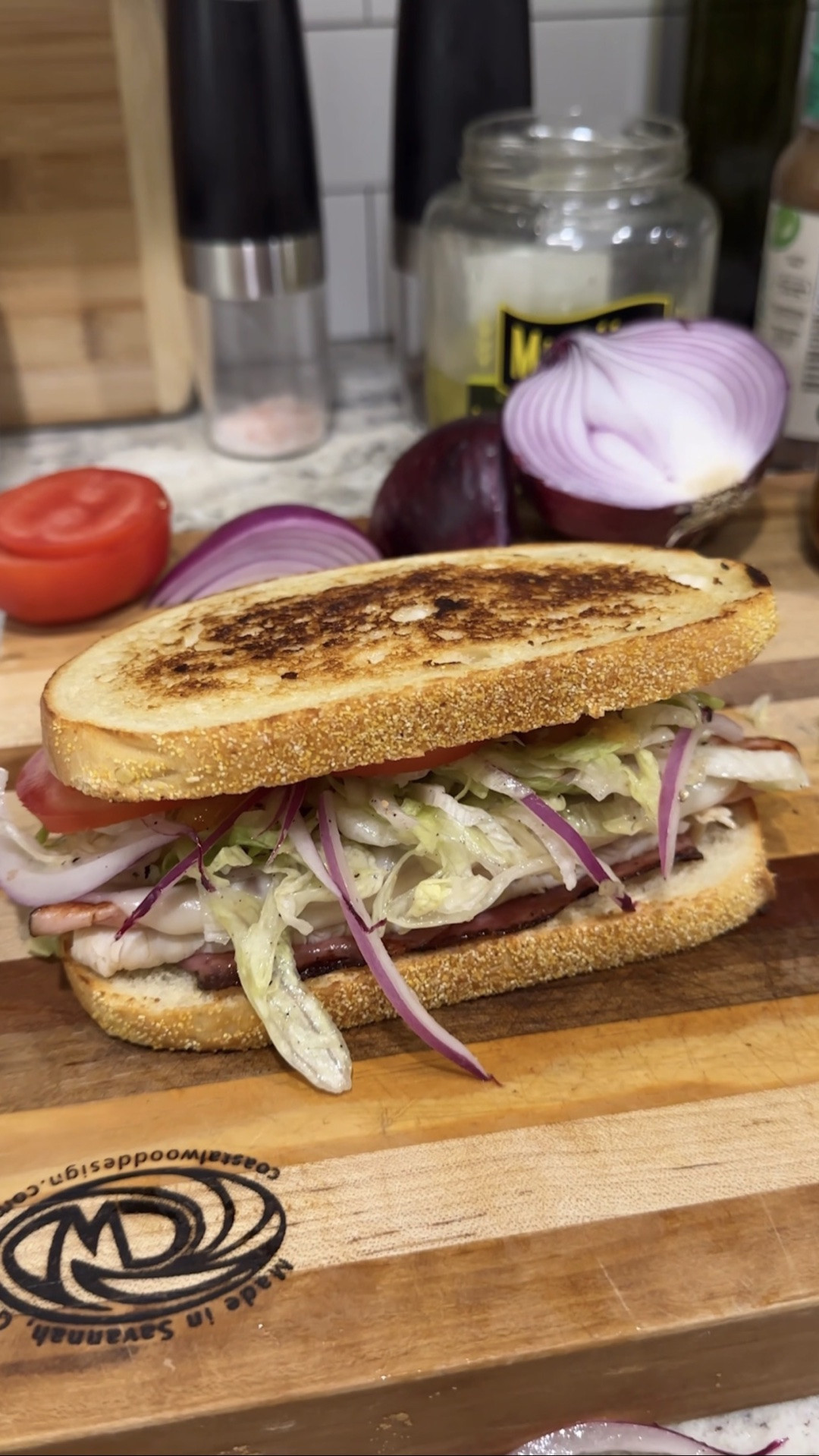 POV: your husband cooks lunch and it slaps 😂🥪 Save this before you scroll!

The Perfect Summer Sandwich
Ingredients:
• Sourdough bread
• Mayo
• Pepperoni, ham, turkey & salami
• Provolone cheese
• Shredded lettuce & purple onion
• Banana peppers & sliced tomato
• Noonan's Own organic oil & vinegar
• Salt & pepper

Steps:
1. Mayo side down on medium high heat until golden
2. Heat meats in same pan, flip, add provolone, cover to melt
3. Toss lettuce + onion with oil, vinegar, salt & pepper
4. Layer meats, lettuce mix, banana peppers & tomato
5. Top with bread, cut in half, done! 🙌
6. Add any toppings you love — this is just the starting point!

Let me know if you try it 👇 and tell me if you want more recipes from Chance because I think he needs his own series 😂

#sandwichrecipe #summerlunch #easyrecipes #lunchideas #sandwichlovers