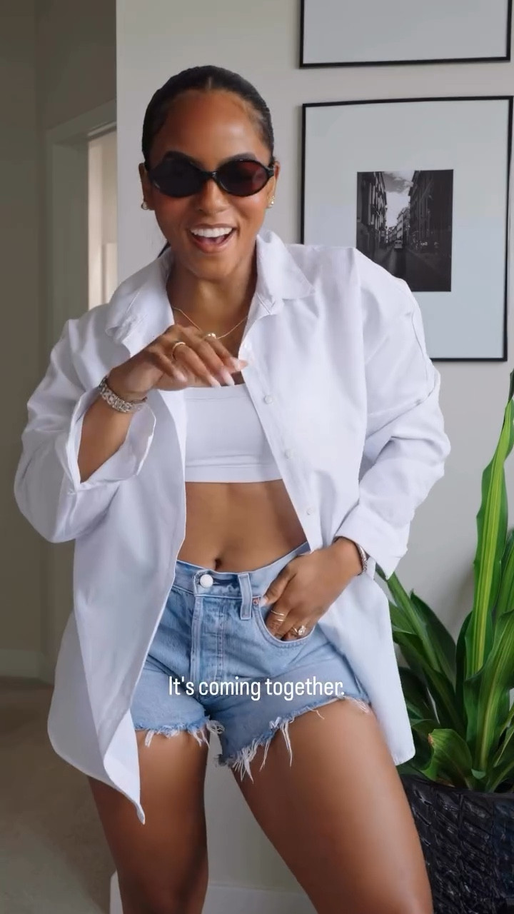 You truly can’t go wrong with a white button down 🤌I’ve worn this shirt so many ways and it’s so easy and light to put on in the summer! Should I have tried with jeans instead? Or I get a pass? 👀
Outfit Deets:
Shirt: @amazon 
Bra and shorts: @aritzia 
Bag: @zara 
Outfit linked in my LTK💋

#ootd #outfitinspo #summeroutfit #whitebuttondown #jeansshorts #capsulewardrobe