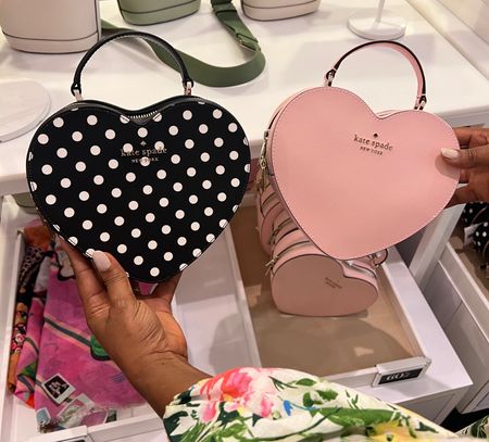 The well loved heart bag comes in pink and black polka dot 

#LTKitbag #LTKstyletip