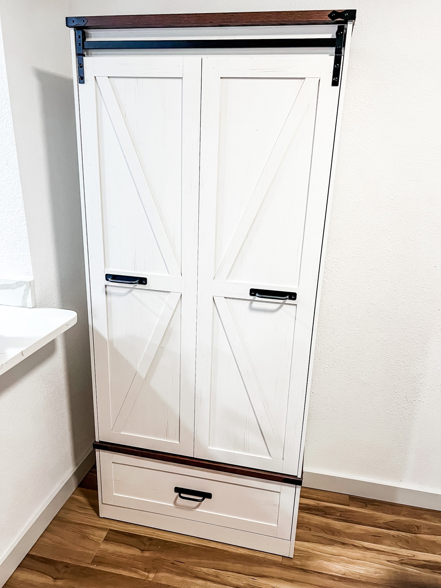 Farmhouse storage cabinet/pantry mine is the white color 

#LTKGiftGuide #LTKHome #LTKSaleAlert