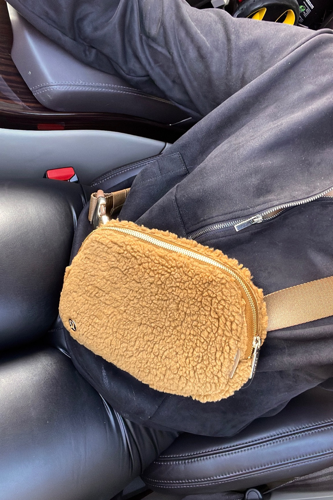 Suede half zip pullover, black leather leggings, & the fleece Lululemon everywhere belt bag in brown. 

#LTKstyletip #LTKGiftGuide #LTKFind