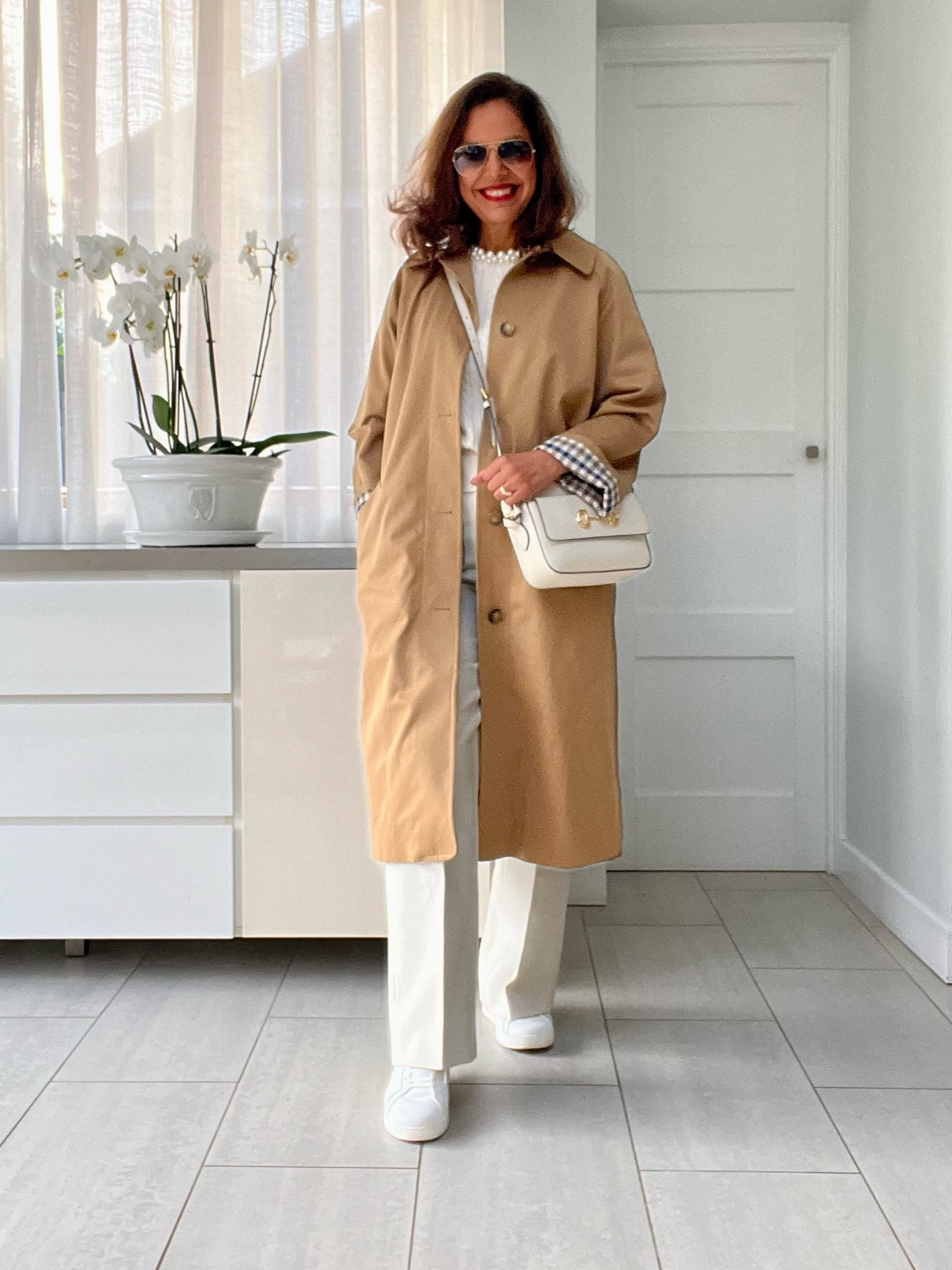 Sezane, Fit flop, bags, petite fashion, workwear fashion, 
transitional outfit, transitional style, autumn outfit ideas, autumn fashion, evening outfit, autumn styling, wide leg trousers, white trainers, crossbody bag, neutral outfit ideas, autumn work outfits, smart casual outfits, white smart outfit, over 50 styling tips, Trench coat, camel coat, camel mac, camel trench

#LTKover50style #LTKstyletip #LTKautumn