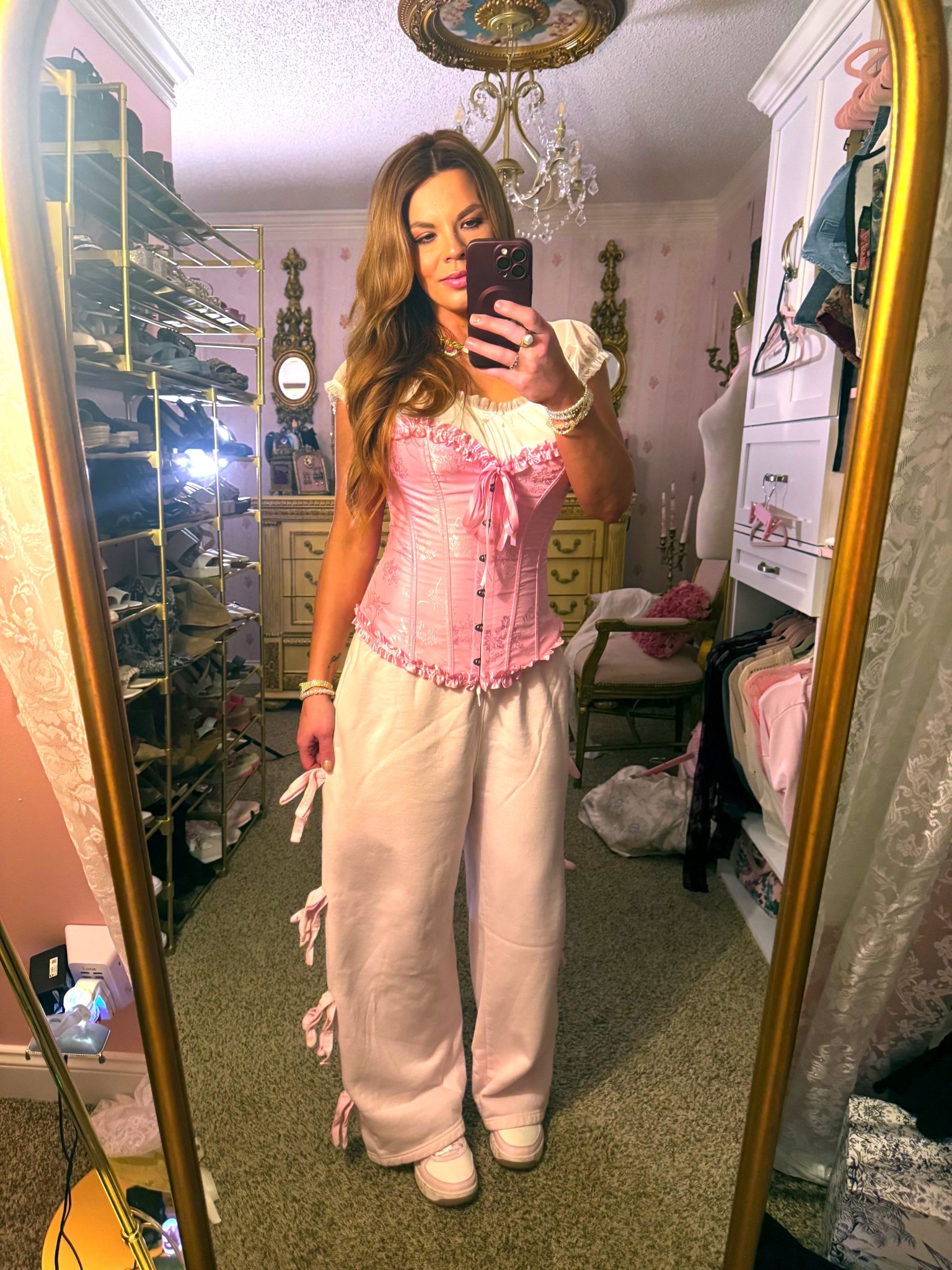 Stepping out in lounge pants is something I don’t do often ! I've had these for years, and the pink bows down the sides are just too cute. I usually avoid tennis shoes because ironically, they do hurt my feet (I have very high arches) but Skechers have been a brand the most comfortable to me and I love their floral shoes! Paired it all with a pink corset for a fun twist because why not? 🩷👑💅🏻

#LTKgrwm #LTKFindsUnder50 #LTKOver40