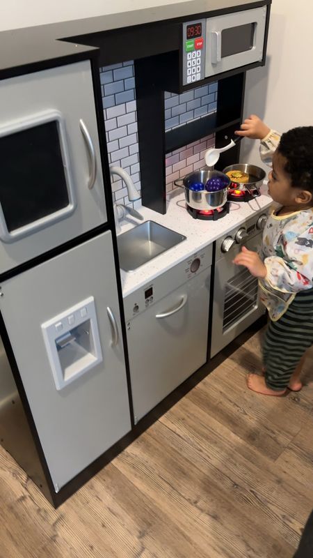 The cutest toy kitchen for toddlers and kids that lights up and makes real life cooking sounds 

#LTKbaby #LTKkids #LTKfamily