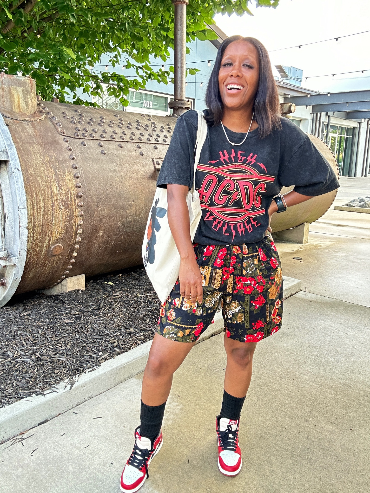 How to style Jordan 1 lost and found sneakers.

ACDC graphic tee with floral Bermuda shorts

I styled this streetwear outfit with a tote bag

#LTKStyleTip #LTKBacktoSchool #LTKShoeCrush