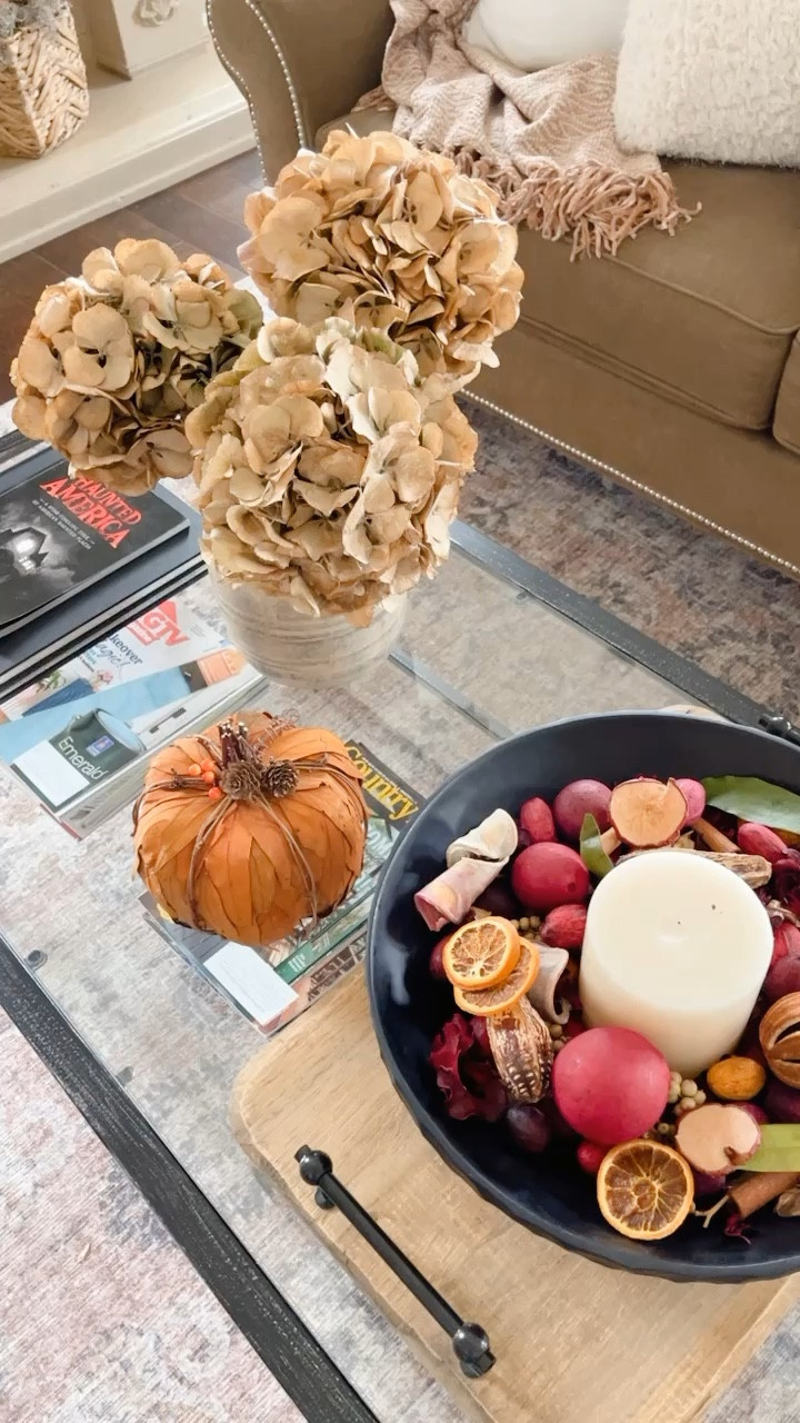 Here’s a little fall inspo for your coffee table.  The easiest fall table decor.  Dried stems, fall potpourri, large vase, candle, decorative bowl.  Fall home decor, home decor, fall, home, fall stems, Claire Burke, Amazon, seasonal, home, home decor, coffee table decor, wood tray. 

#LTKunder50 #LTKhome #LTKSeasonal