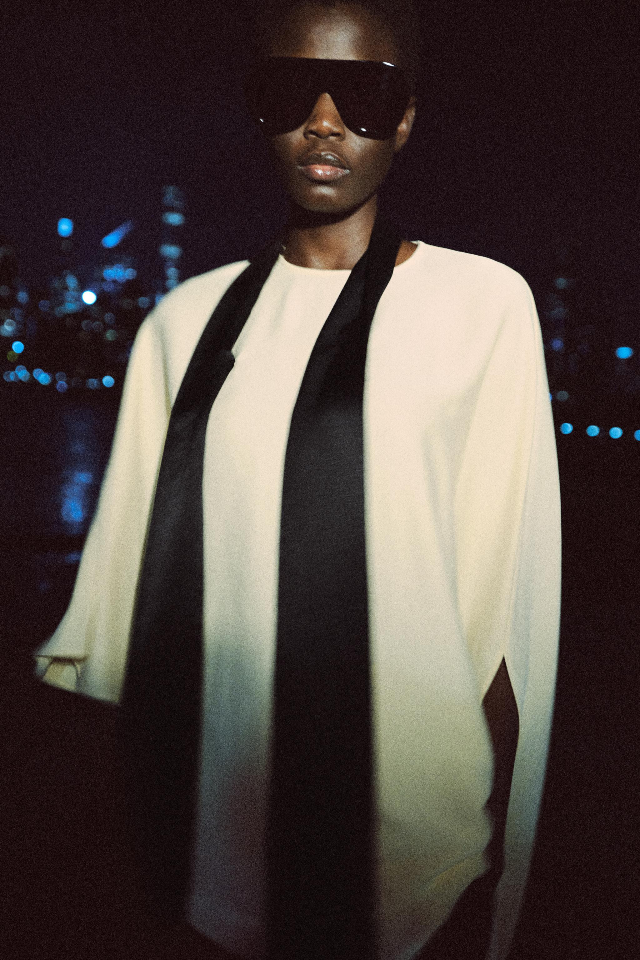 ZARA WOMAN COLLECTIONBlouse made with viscose yarn. Round neck and cape sleeves. Contrasting fabr... | Zara US